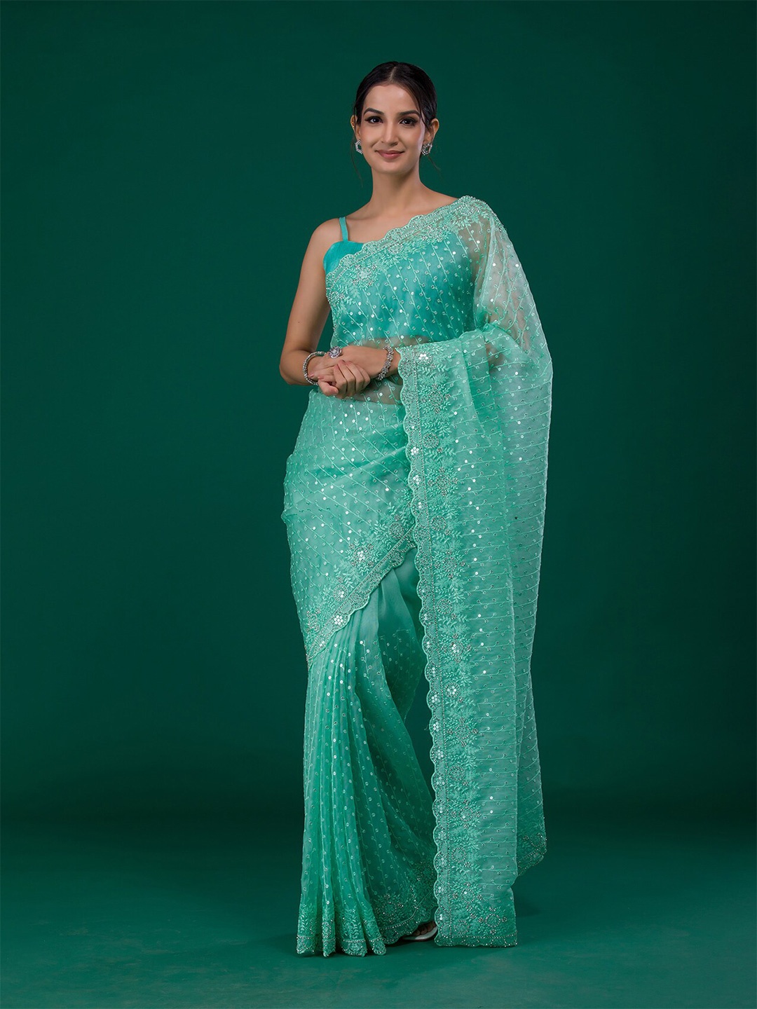 

Koskii Green & Silver-Toned Embellished Sequinned Saree