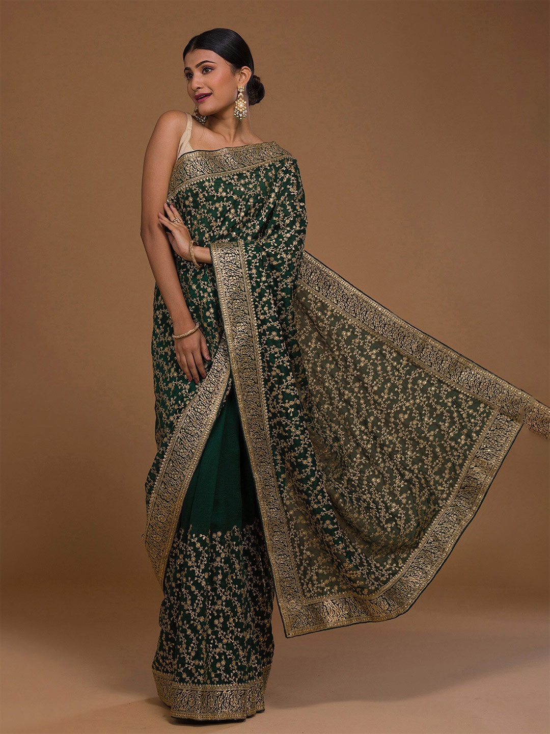

Koskii Green & Gold-Toned Floral Beads and Stones Saree