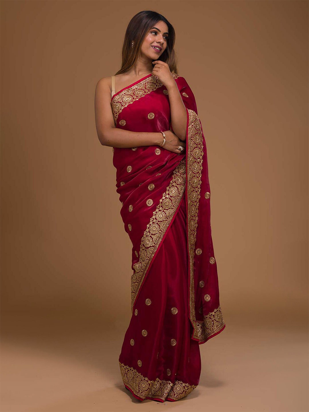 

Koskii Maroon & Gold-Toned Floral Embroidered Art Silk Saree