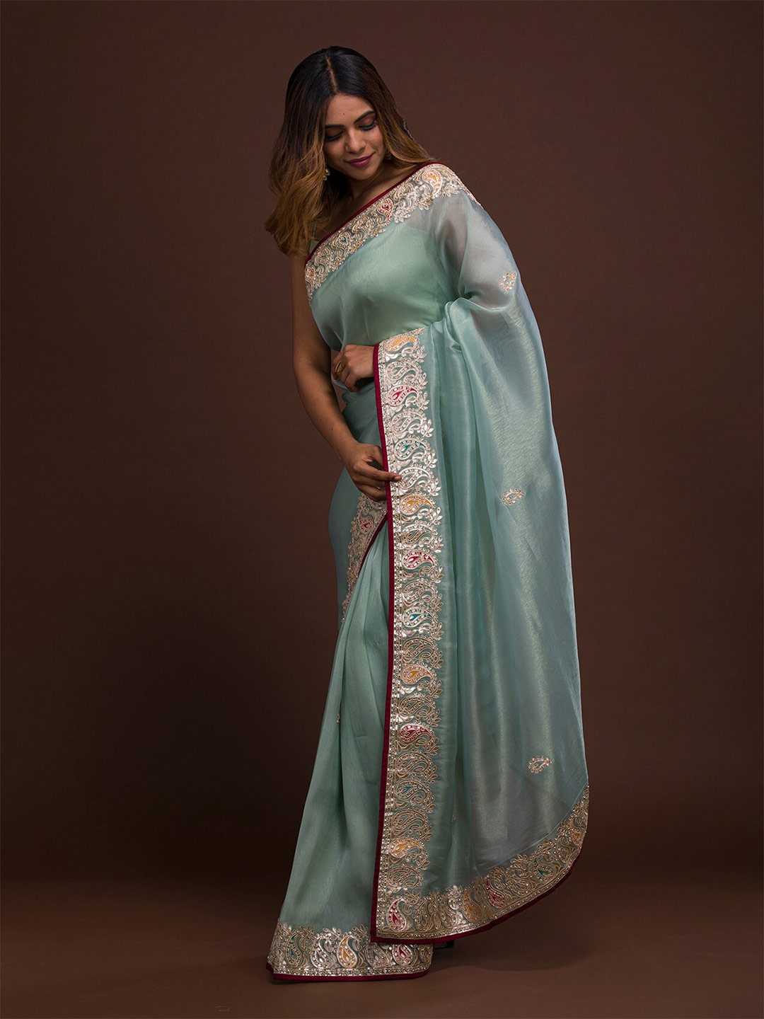 

Koskii Sea Green & Gold Gotta Patti Polyester Saree With Unstitched Blouse Piece