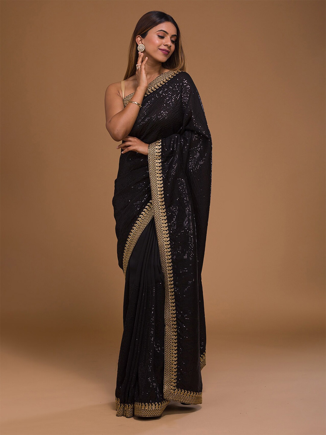 

Koskii Black & Gold Embellished Sequinned Poly Georgette Saree With Unstitched Blouse