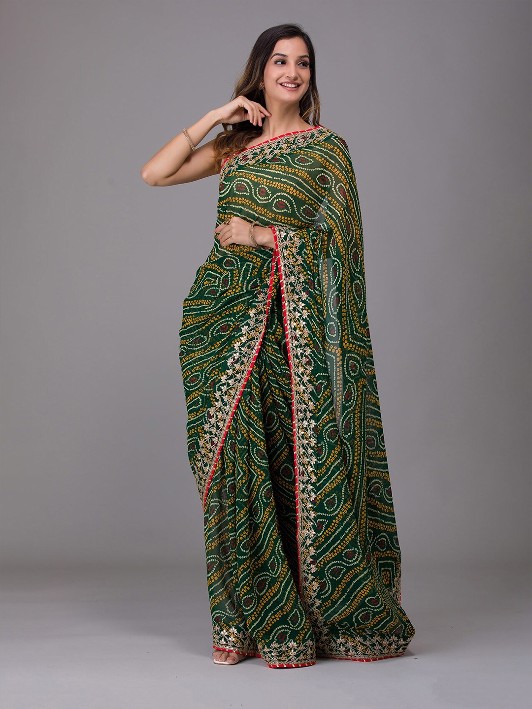 

Koskii Green & Gold Printed Poly Georgette Bandhani Saree With Unstitched Blouse Piece