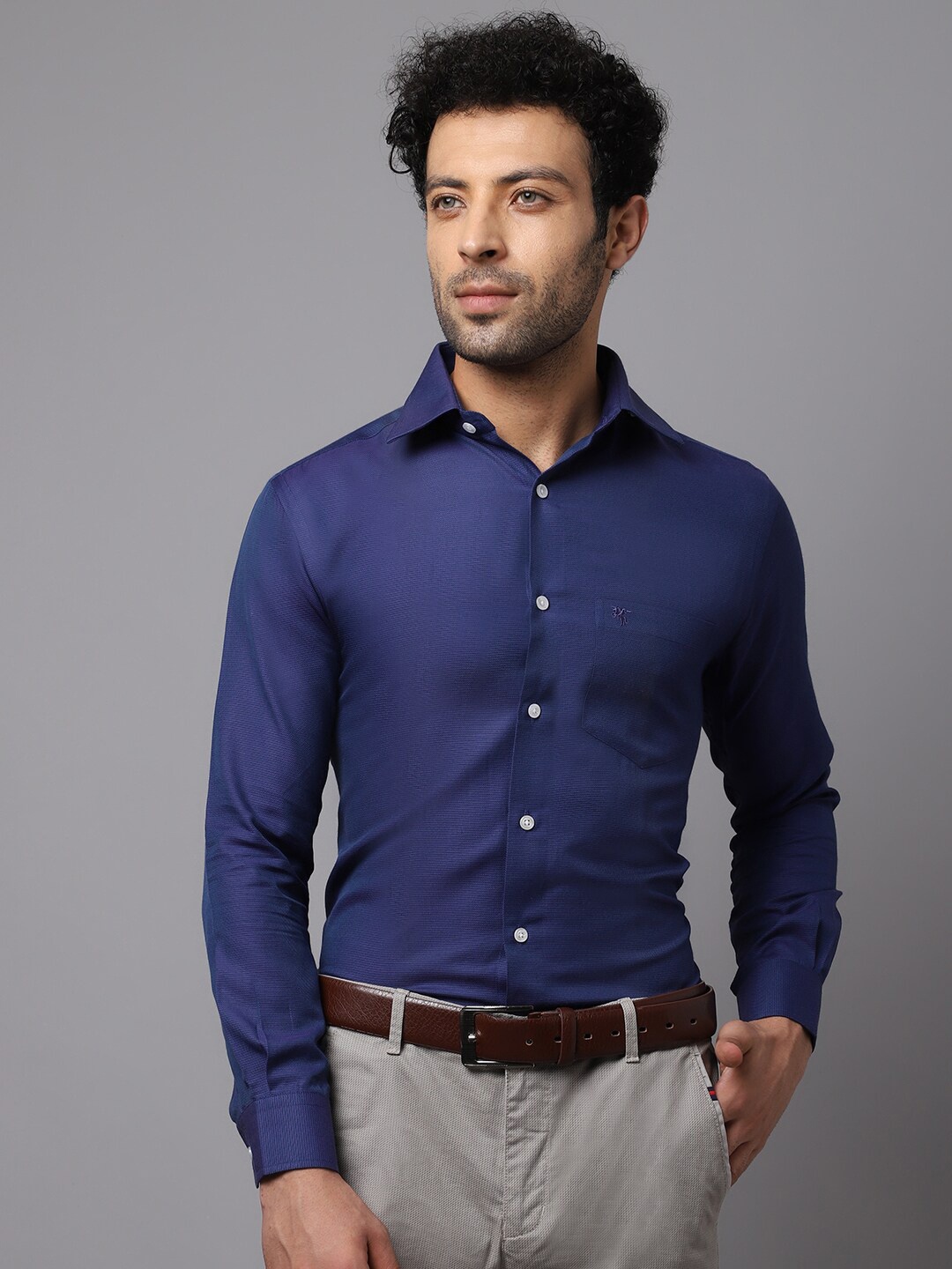 

Cantabil Men Blue Solid Formal Shirt