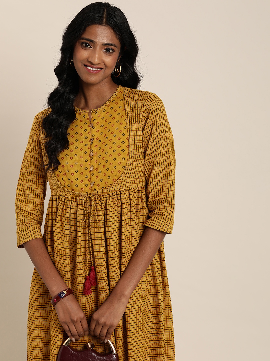 

Taavi Women Bagru Pure Cotton Checked Kurta, Mustard