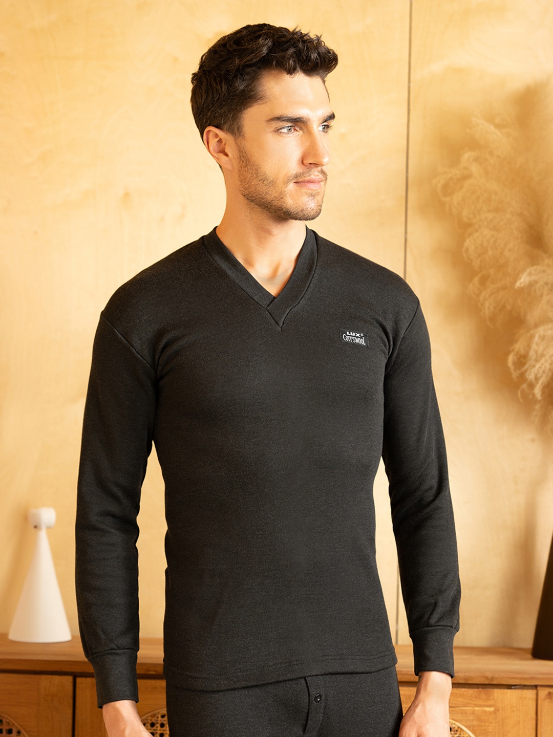 

Lux Cottswool Men Charcoal Solid Cotton Thermal Top