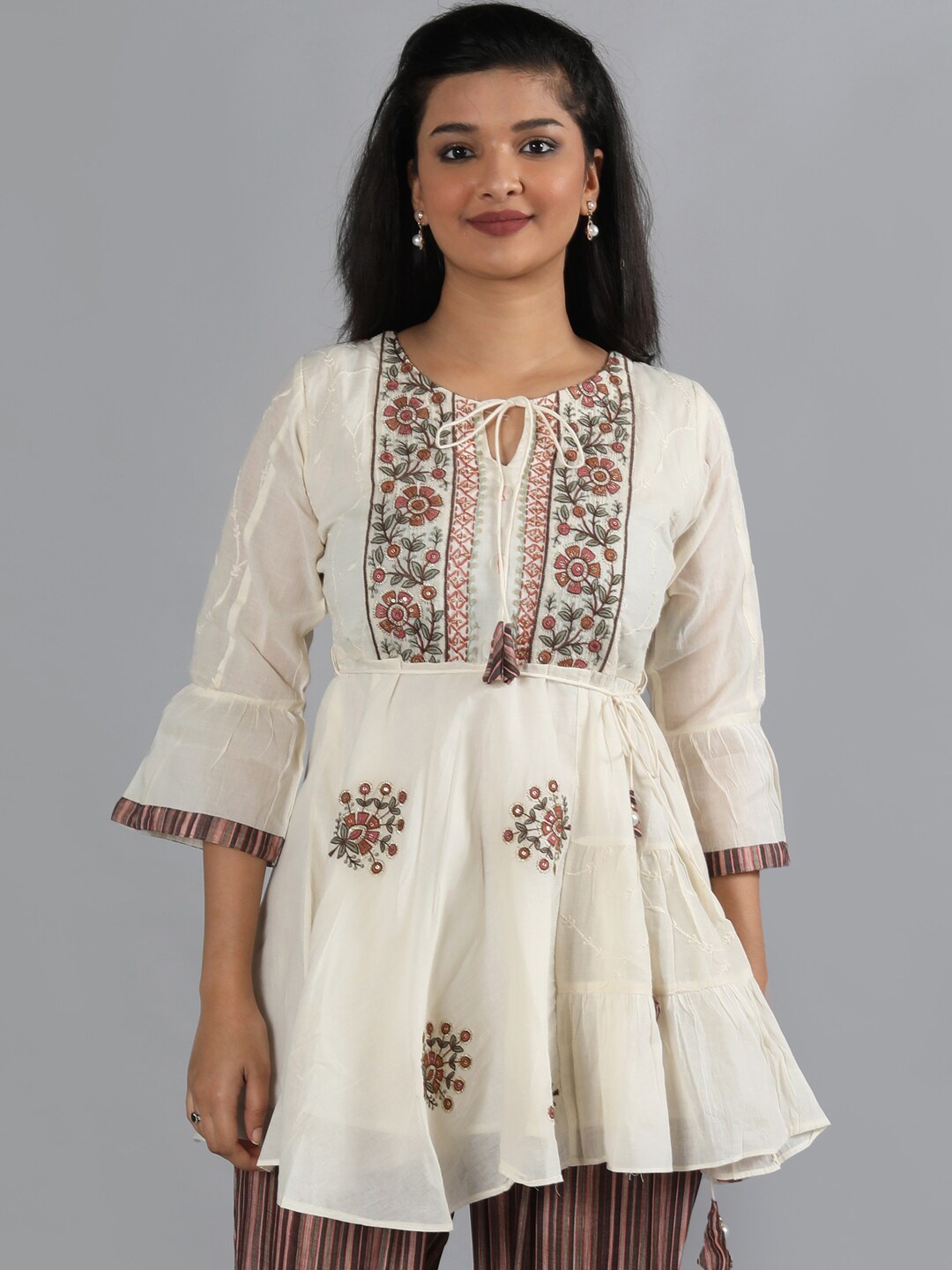 

taruni Women Off White Floral Embroidered Pleated Beads and Stones Pure Cotton Kurti with Trousers