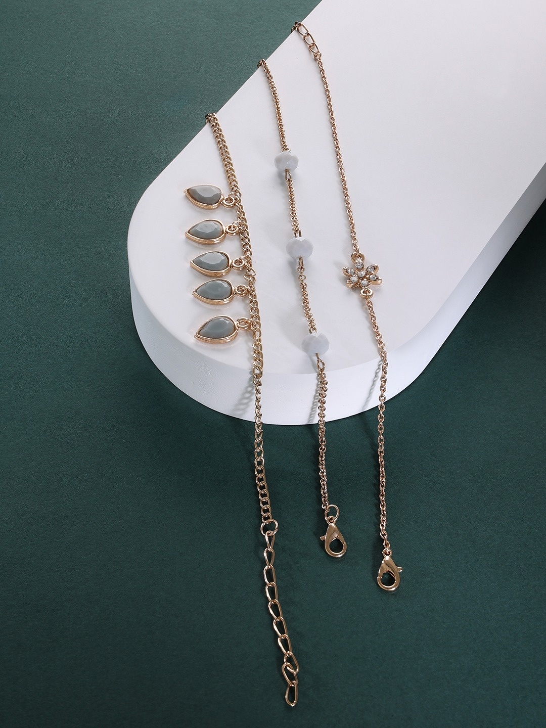 

Zaveri Pearls Women Set of 3 Grey Stones & Beads Embellished Contemporary Stack Bracelets, Gold