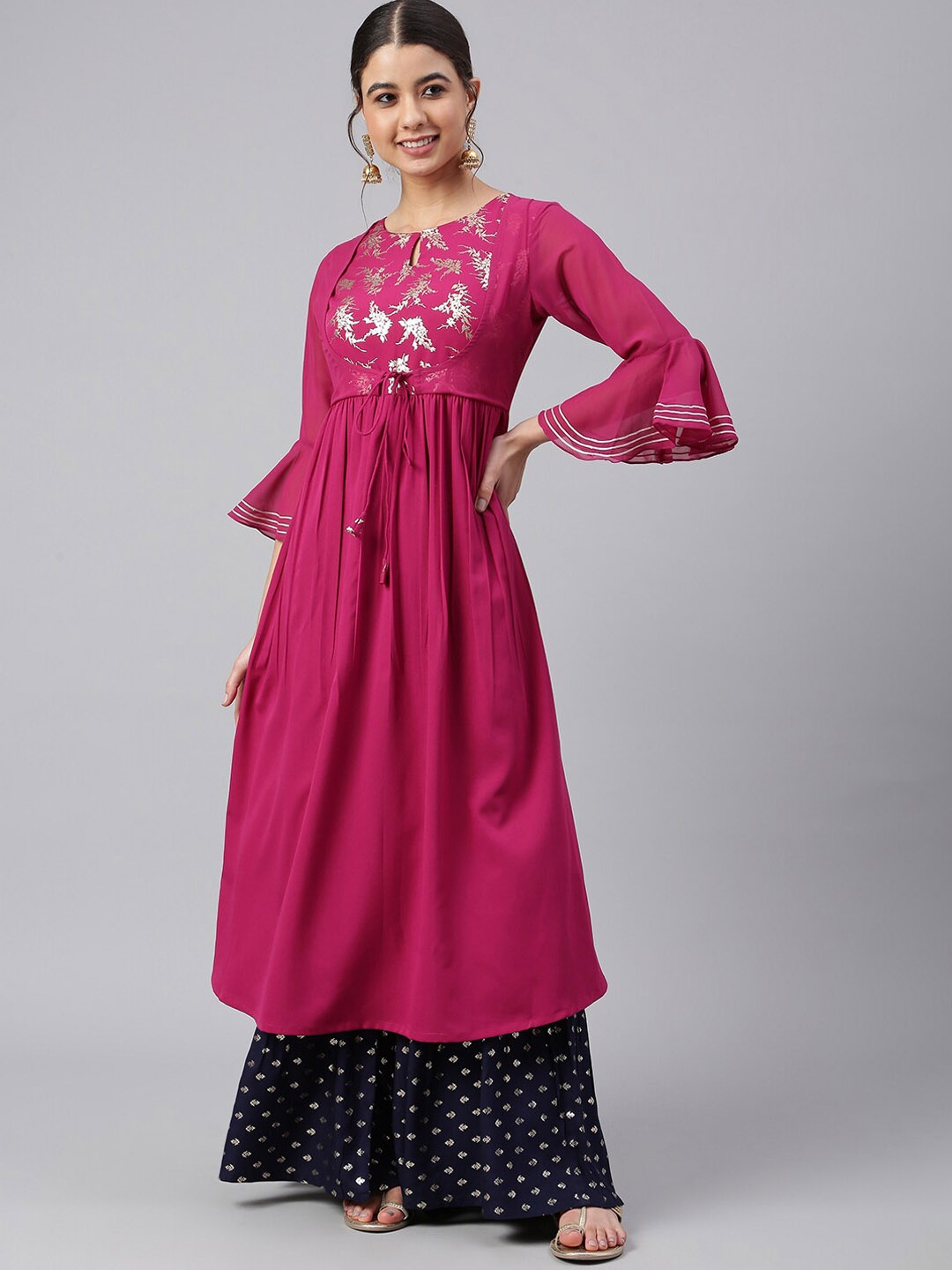 

Janasya Women Maroon Crepe Solid Flared Kurta