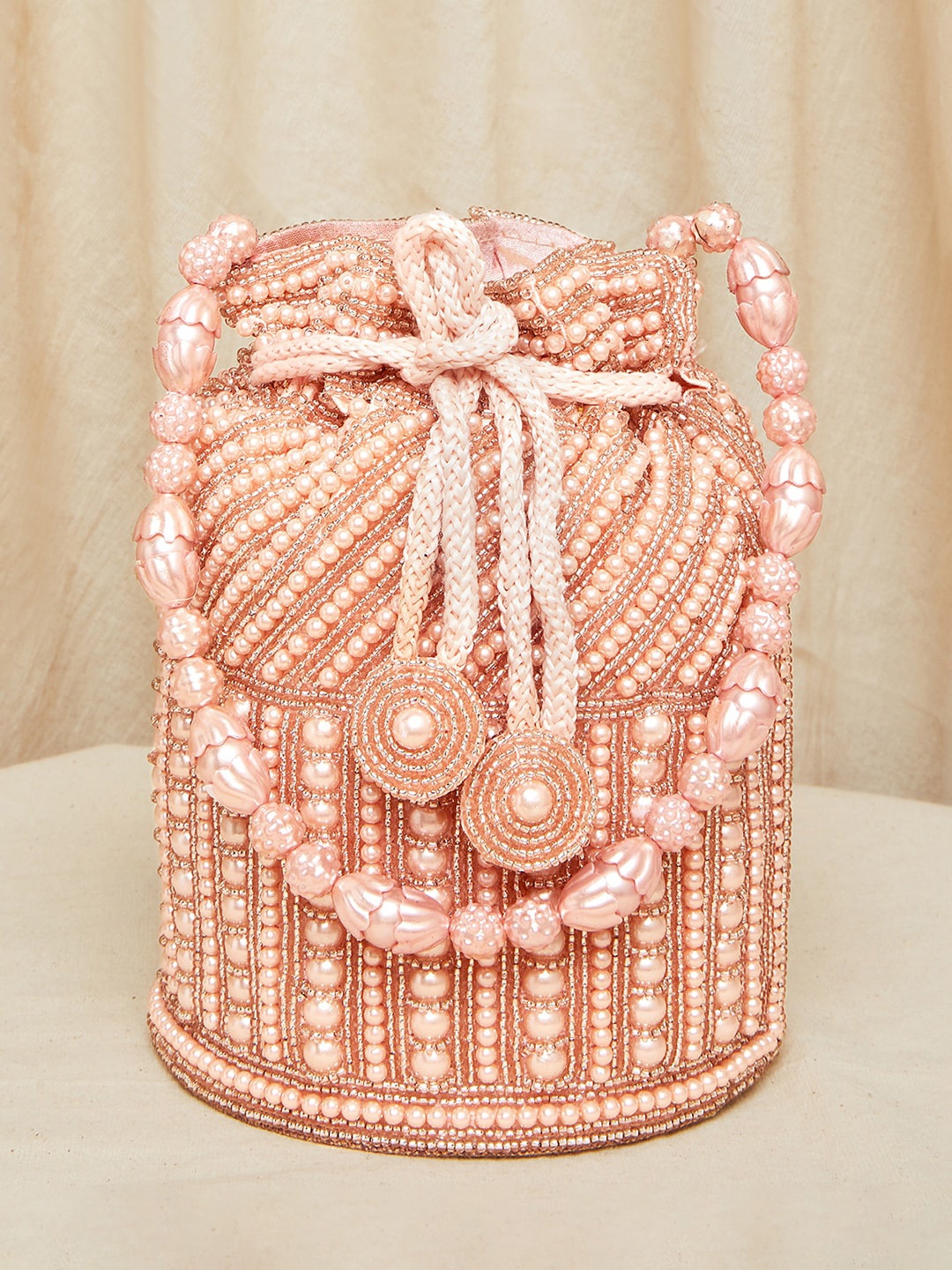 

Peora Rose Gold Embroidered Potli Clutch