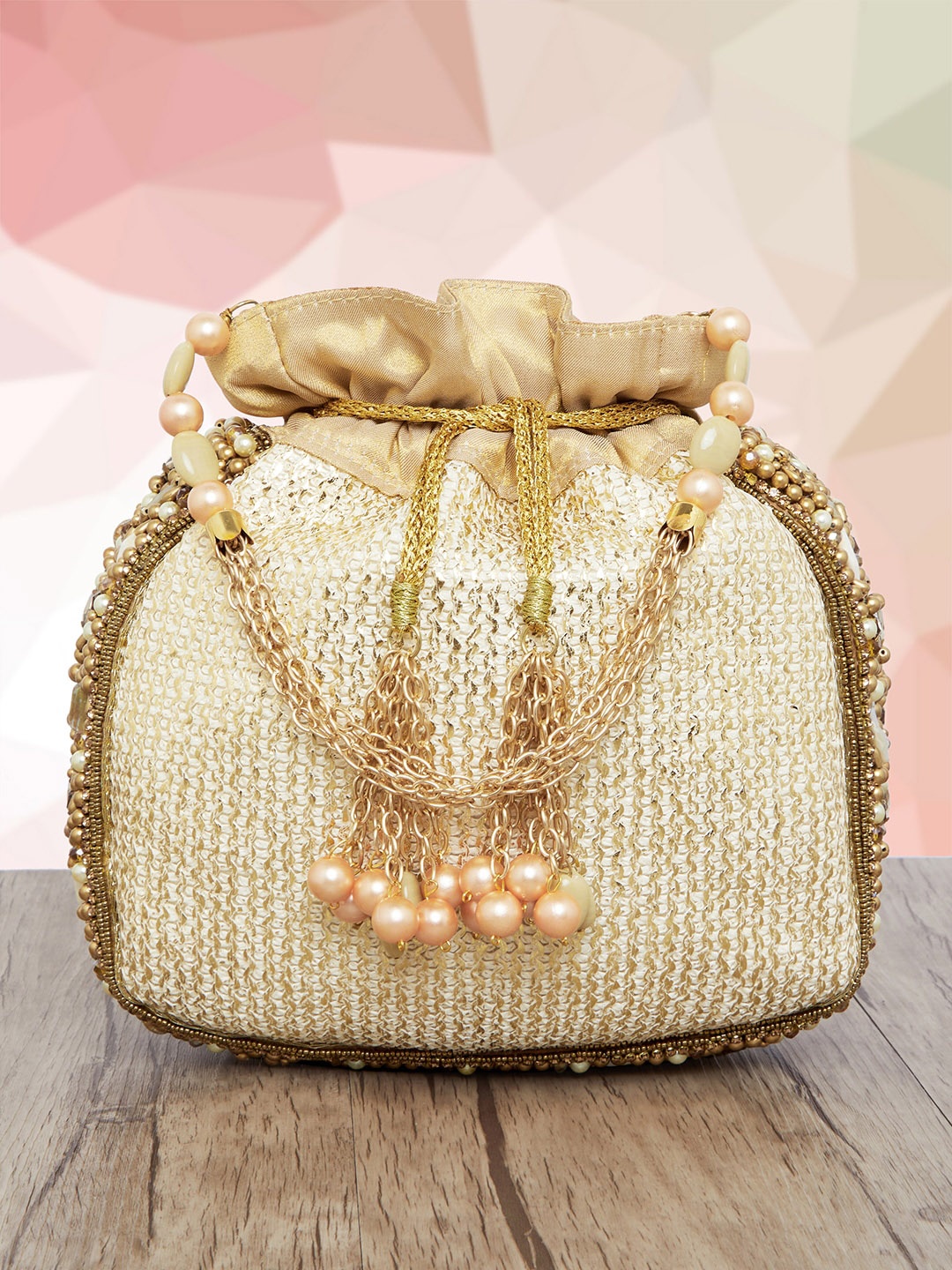 

Peora White & Gold-Toned Embellished Potli Clutch