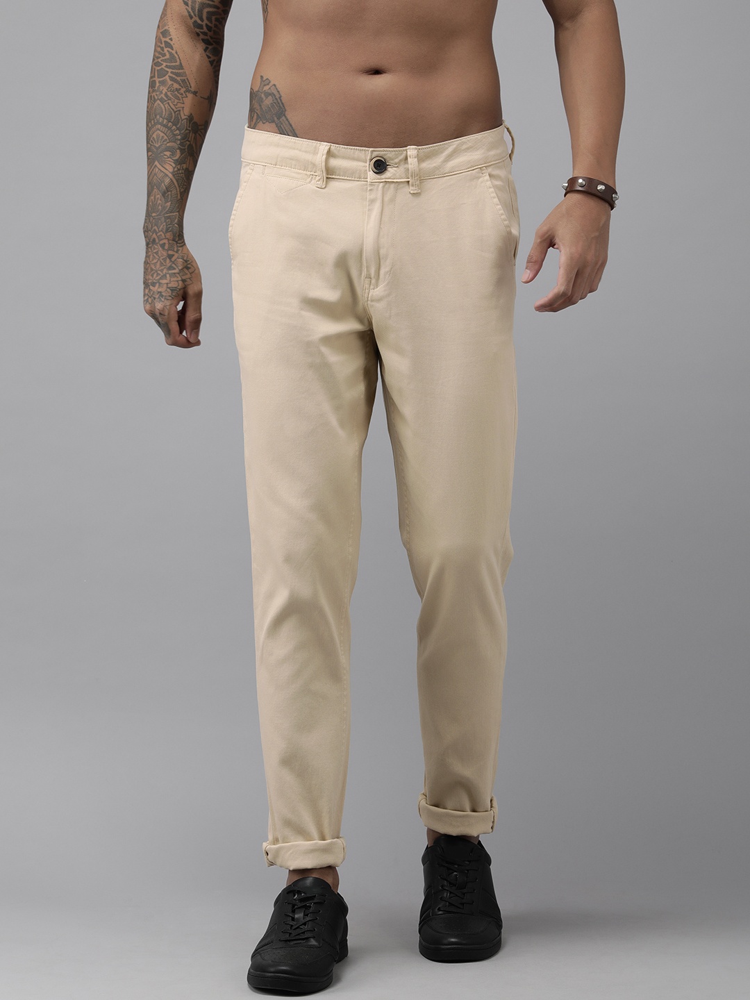 

Roadster Men Beige Solid Slim Fit Trousers