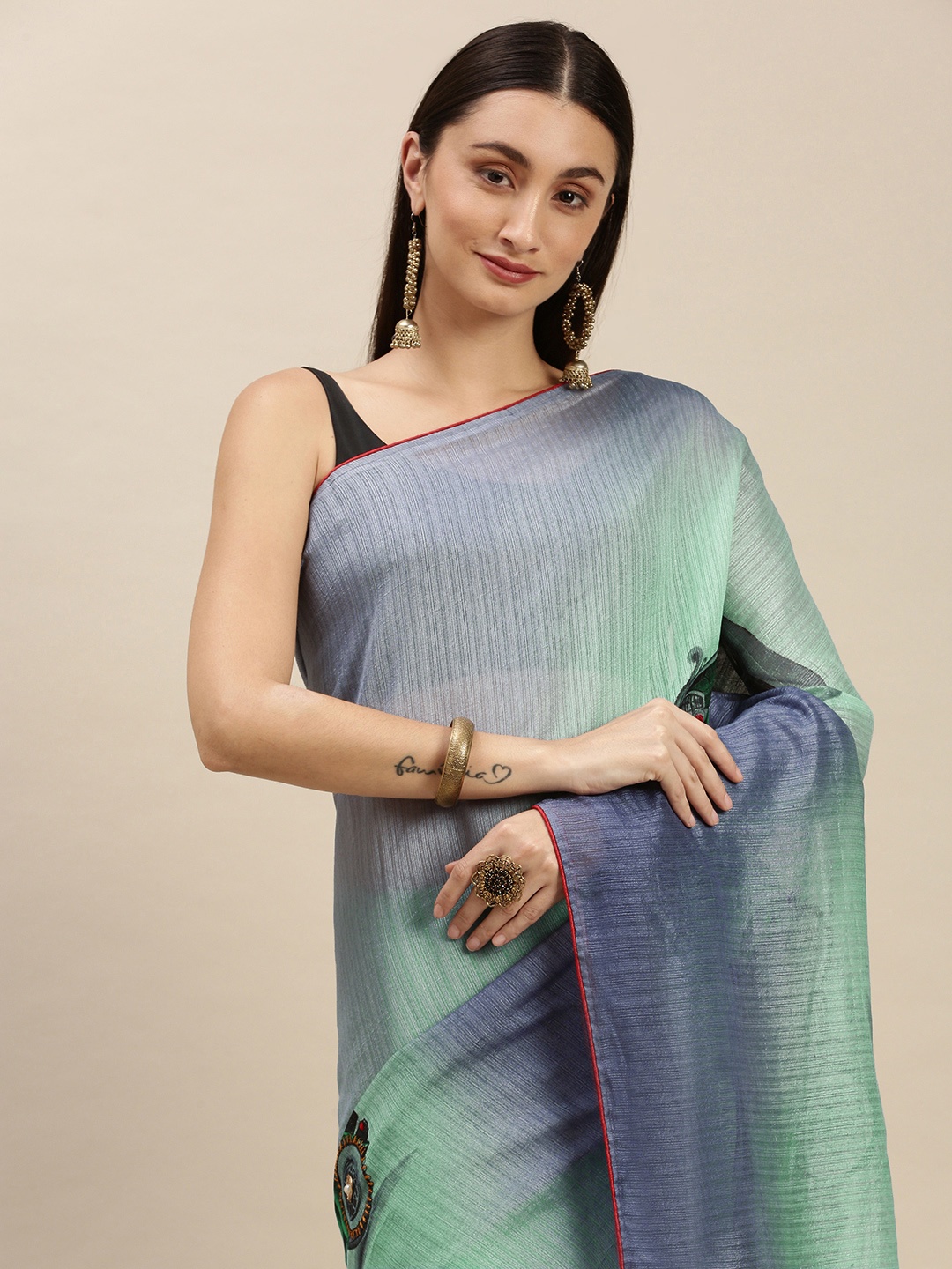 

RACHNA Blue Linen Blend Conversational Printed Saree