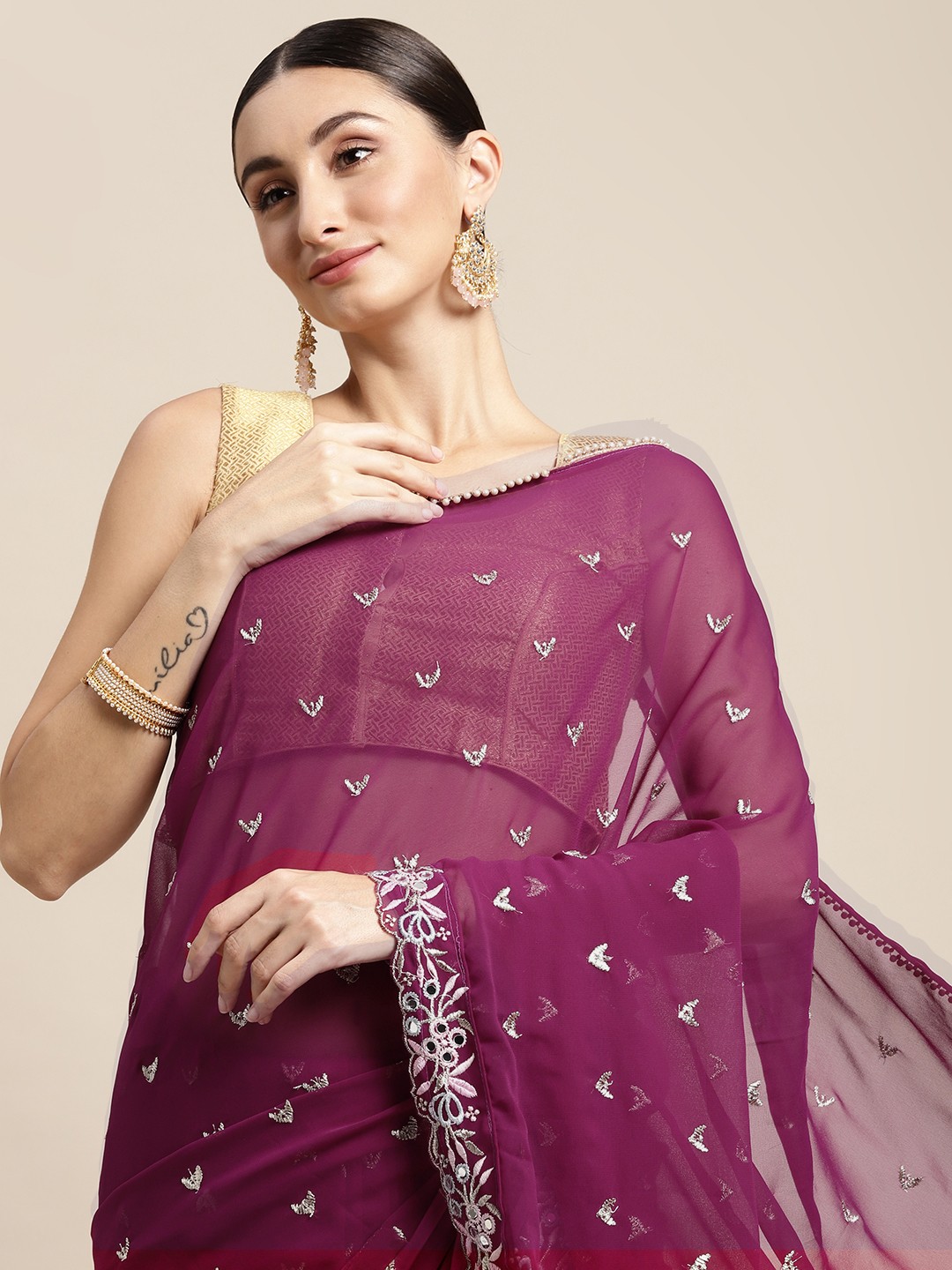 

Mitera Magenta & Silver Floral Mirror Work Ruffle Saree
