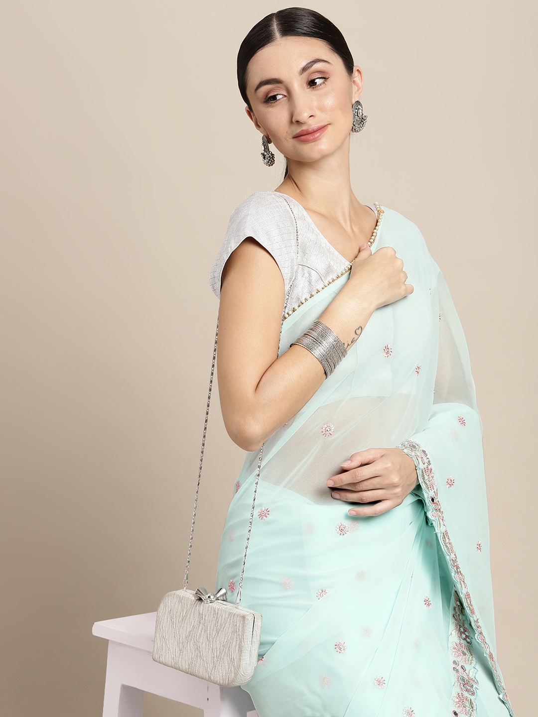 

Mitera Blue & Pink Floral Mirror Work Ruffle Saree