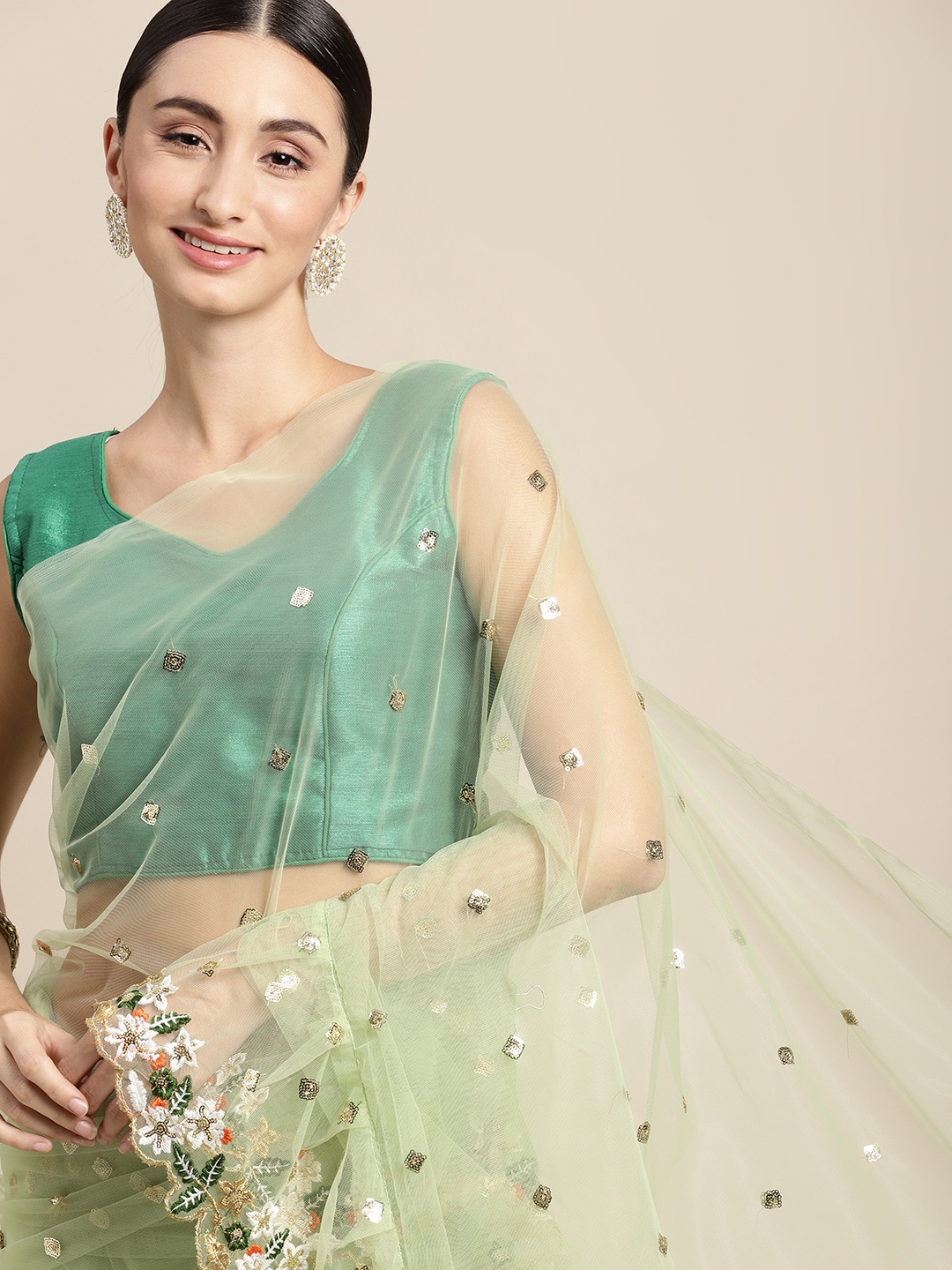 

Mitera Green Floral Sequinned Net Ruffle Saree