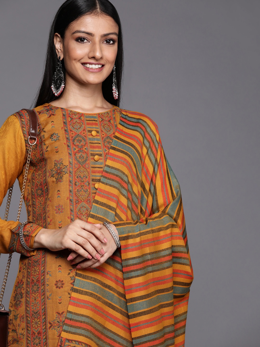 

Inddus Mustard & Green Printed Woven Pashmina Winter Wear Unstitched Dress Material