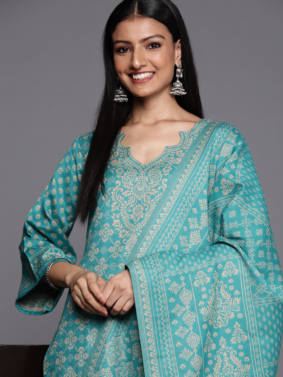 

Inddus Rama Green & Beige Woven Design Pashmina Winter Wear Unstitched Dress Material