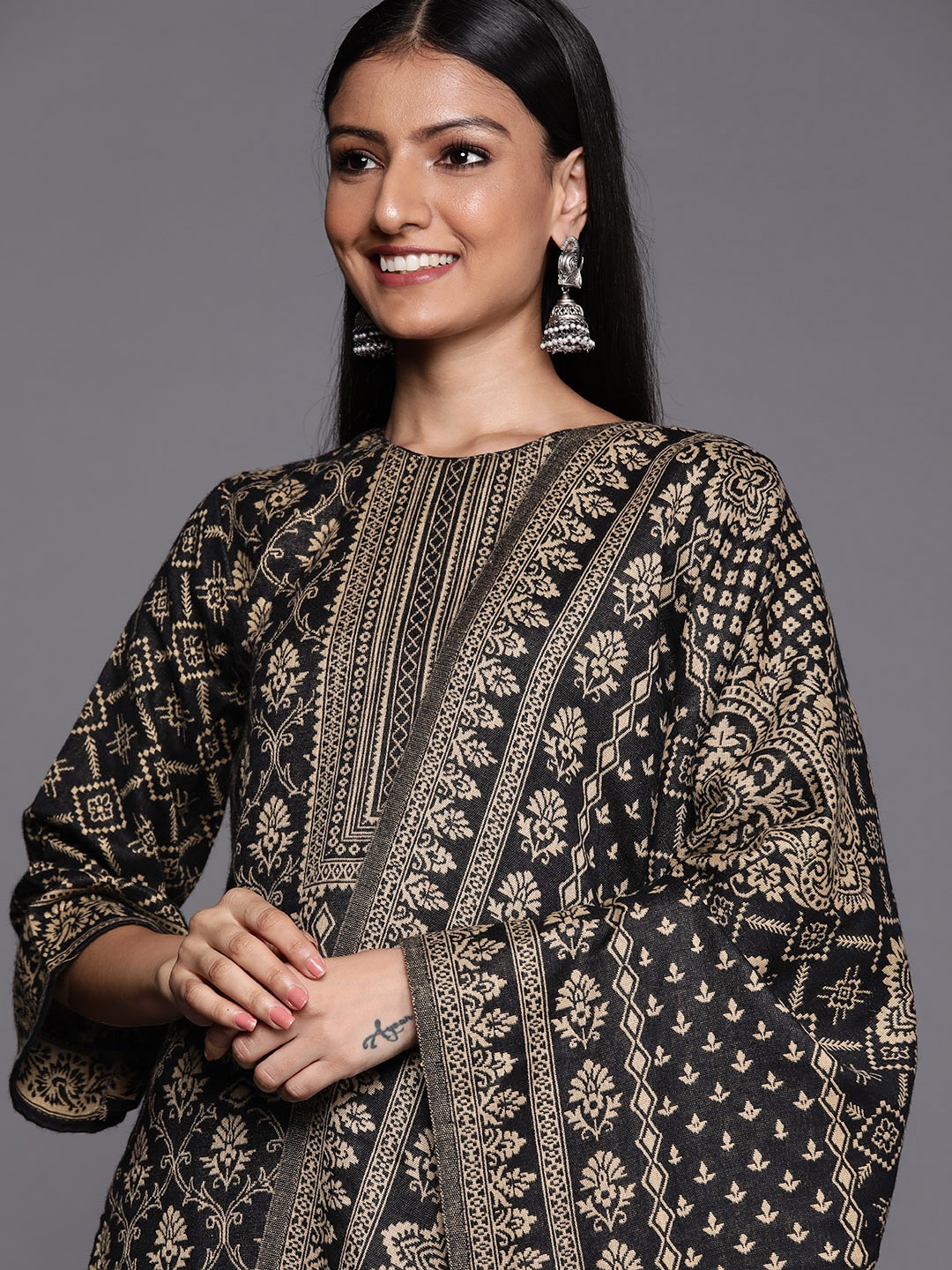 

Inddus Black & Beige Woven Pashmina Winter Wear Unstitched Dress Material