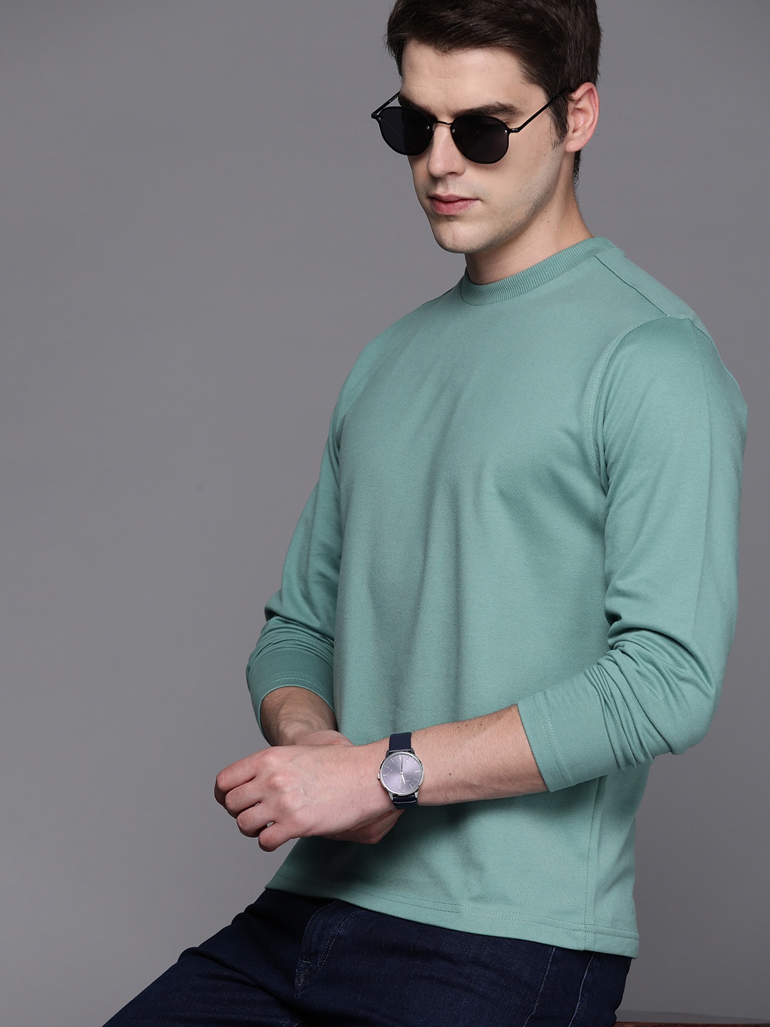 

Allen Solly Men Green Solid Sweatshirt