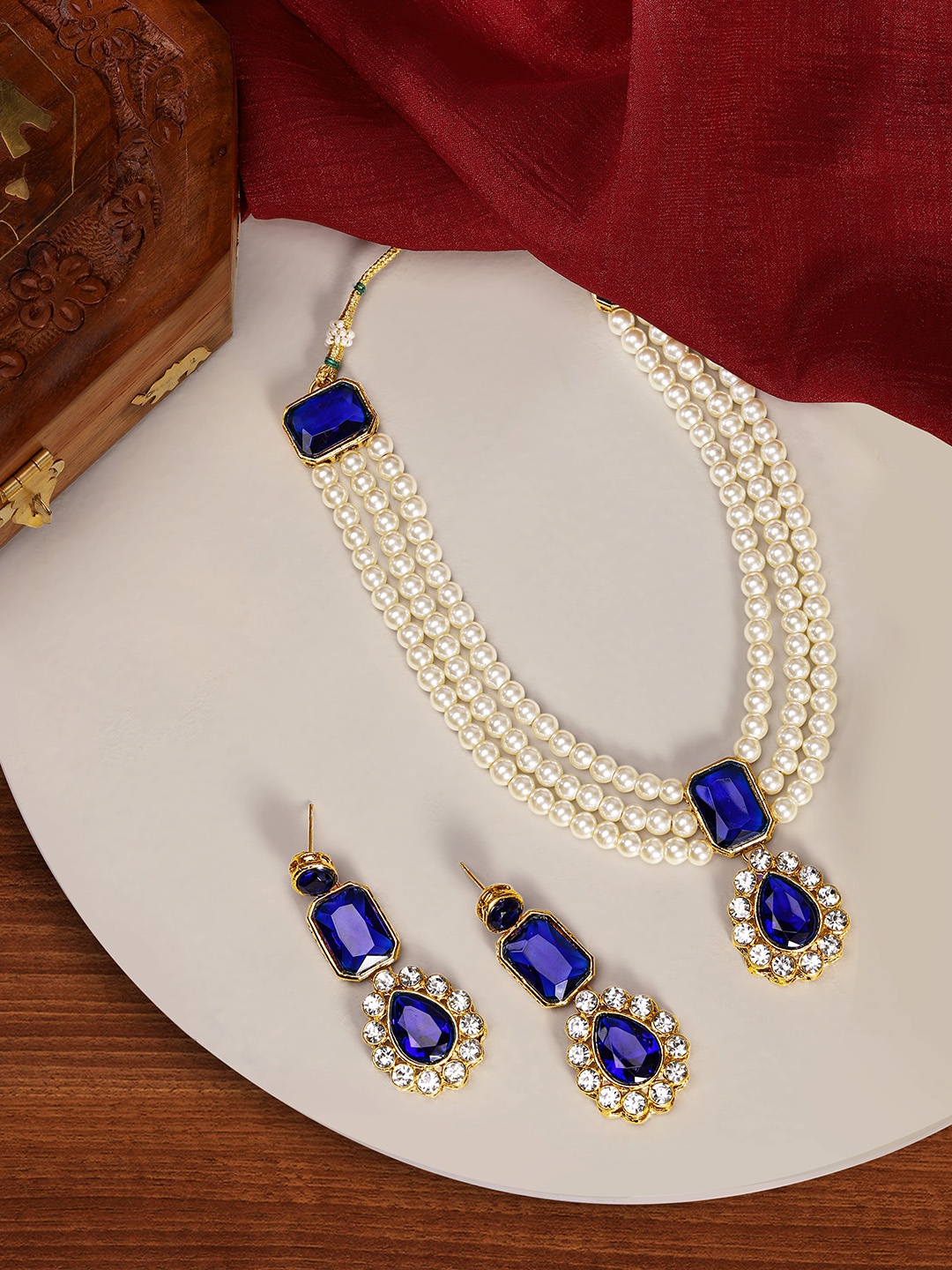 

Peora Gold Plated Blue & White Kundan Studded Beaded Long Necklace Jewellery Set