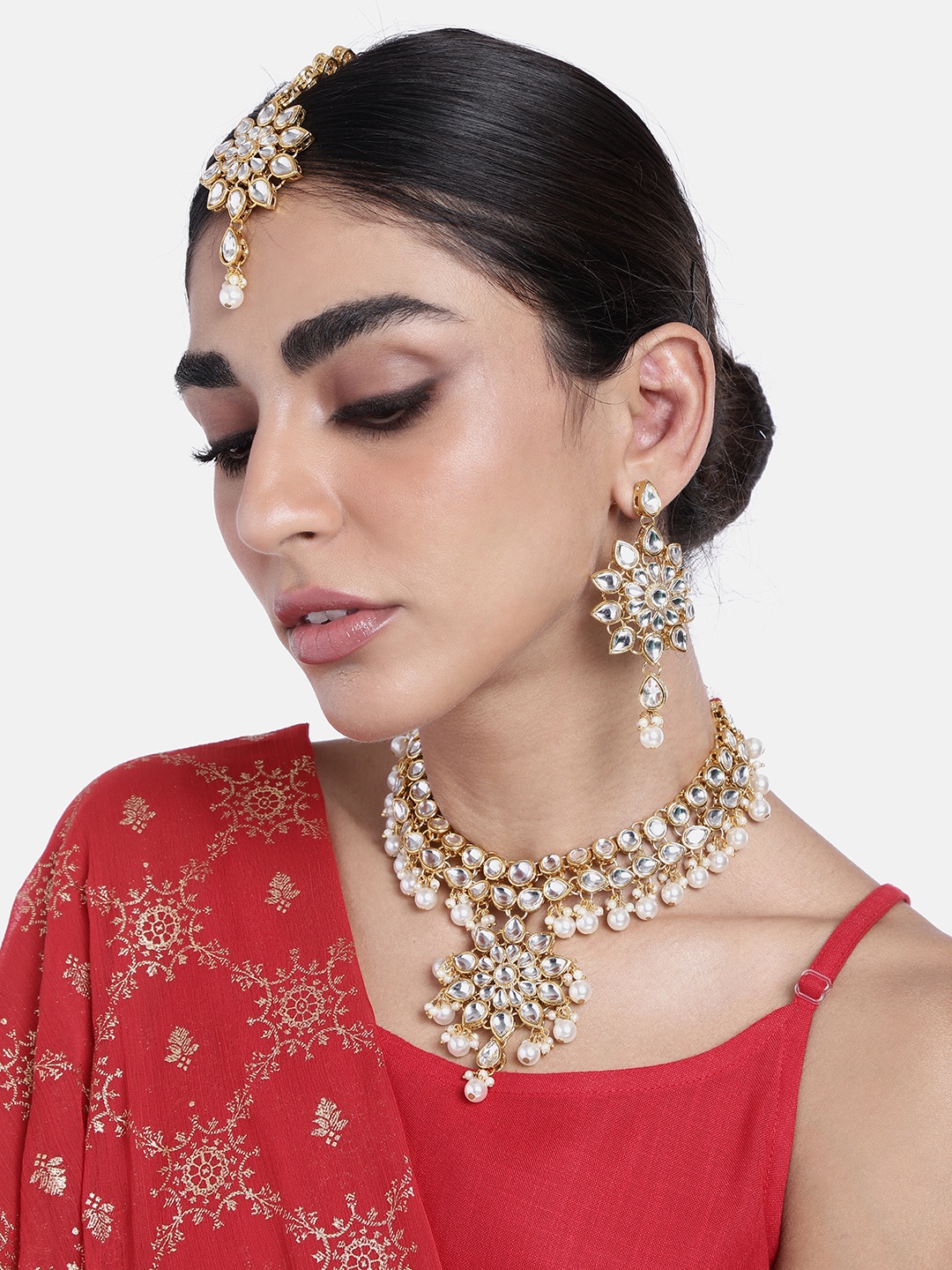 

Peora Gold-Plated & White Pearl Beaded Crystal Studded Jewellery set