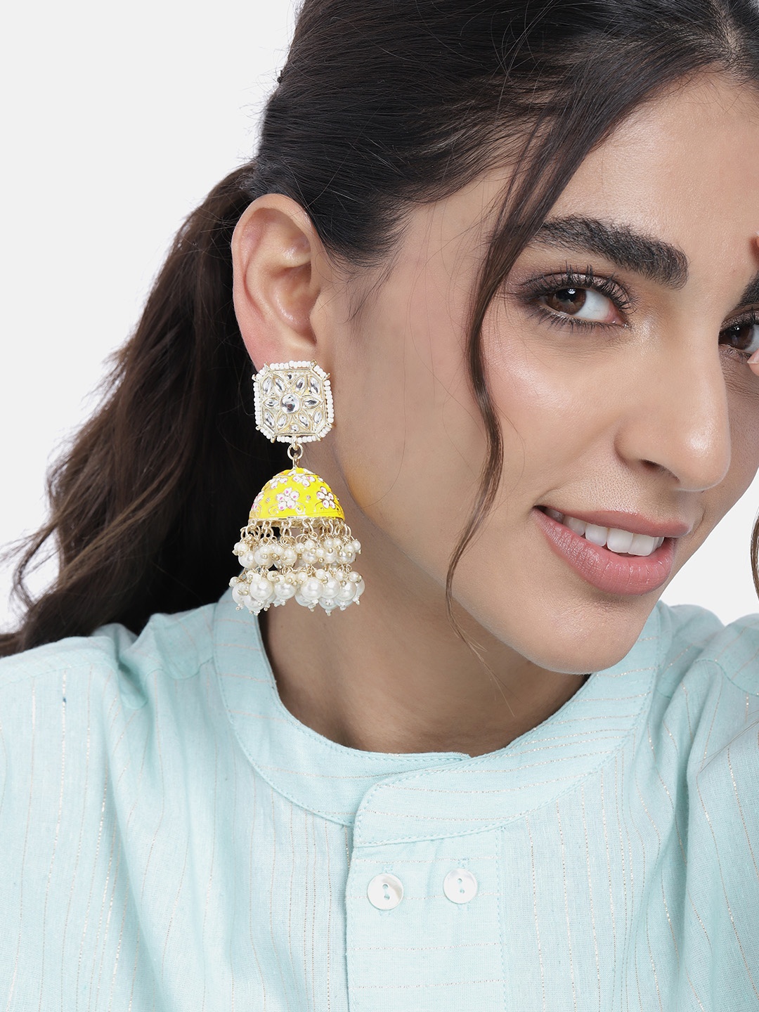 

Peora Yellow Gold Plated Traditional Glided with Kundan Pearls Jhumki