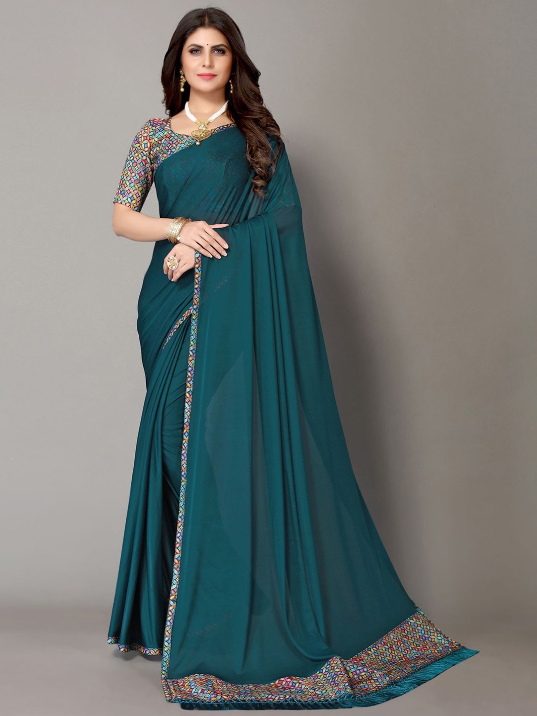 

KALINI Women Teal & Blue Solid Lycra Saree With Unstitched Blouse Piece
