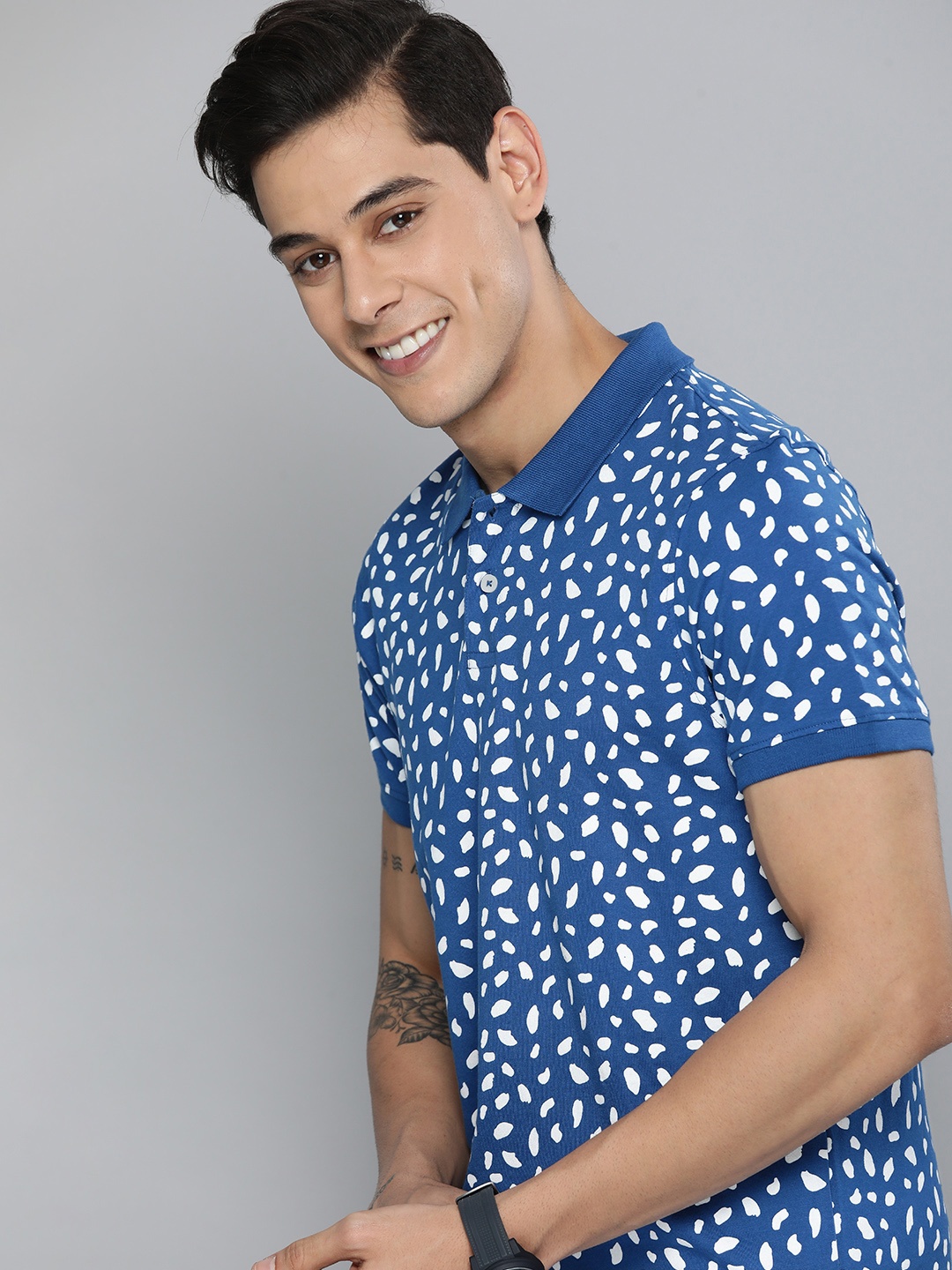 

Mast & Harbour Men Blue & White Printed Polo Collar Pure Cotton T-shirt