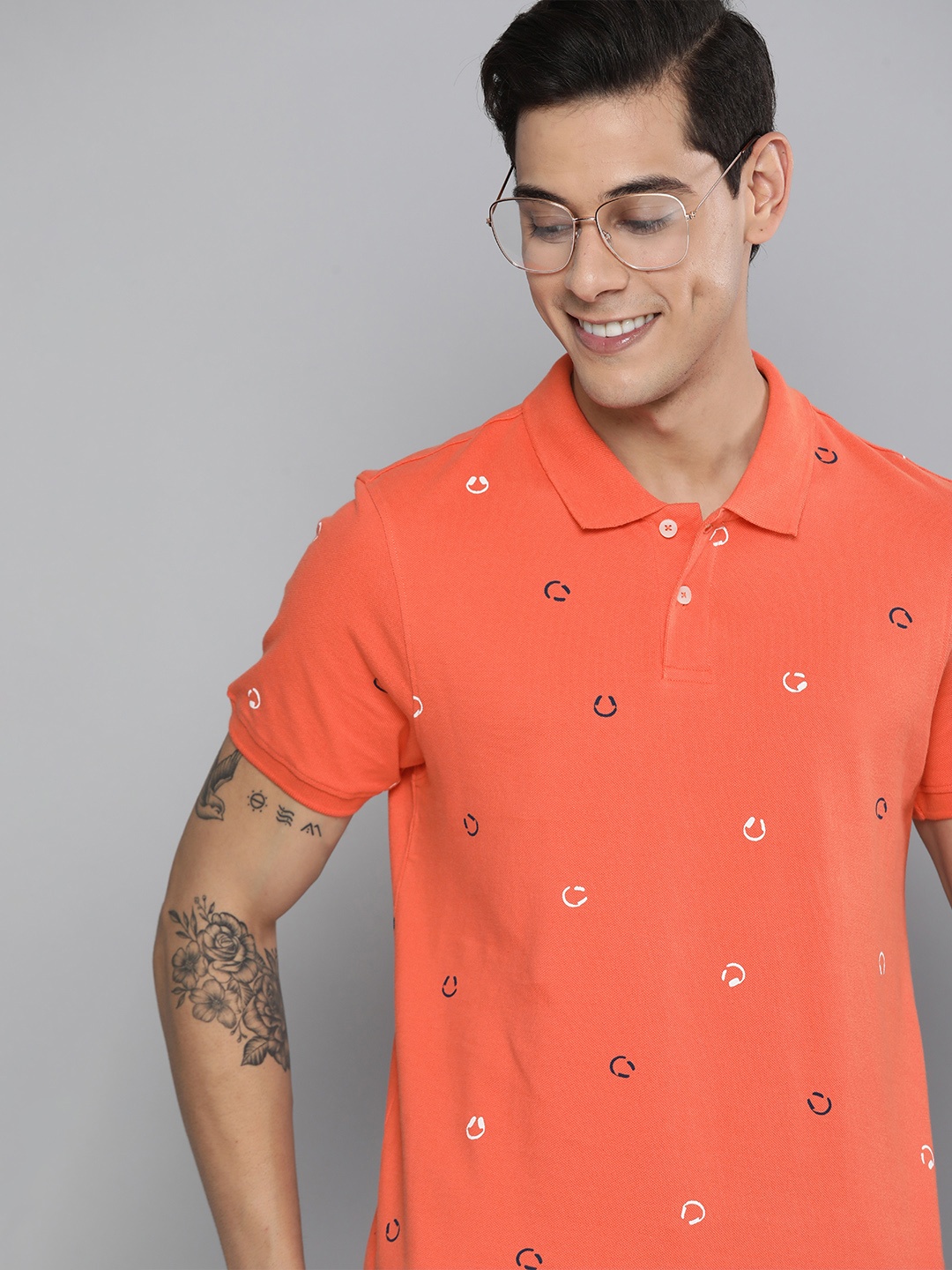 

Mast & Harbour Men Coral Orange Printed Polo Collar Pure Cotton T-shirt