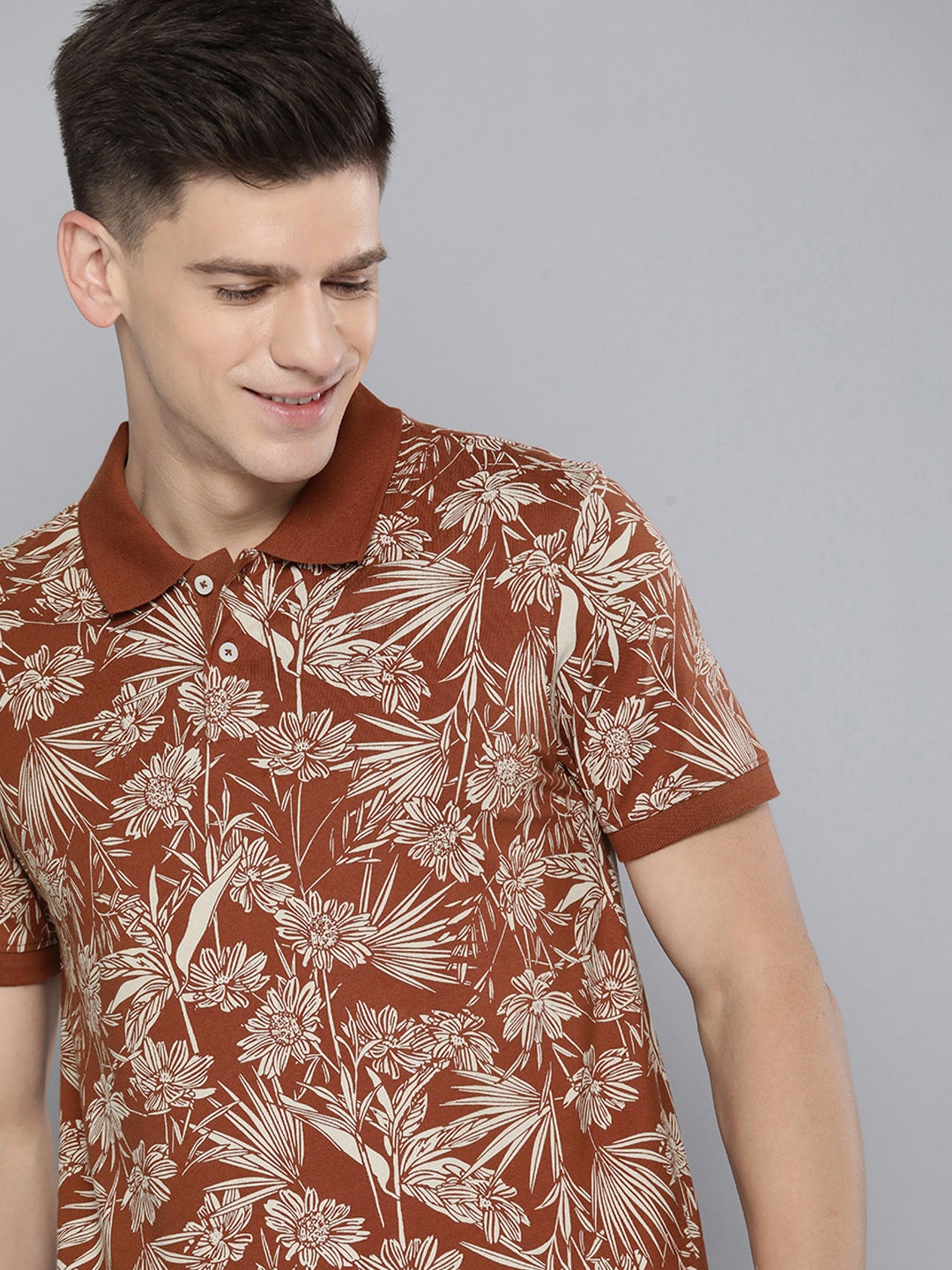 

Mast & Harbour Men Rust & Beige Floral Printed Polo Collar Pure Cotton T-shirt