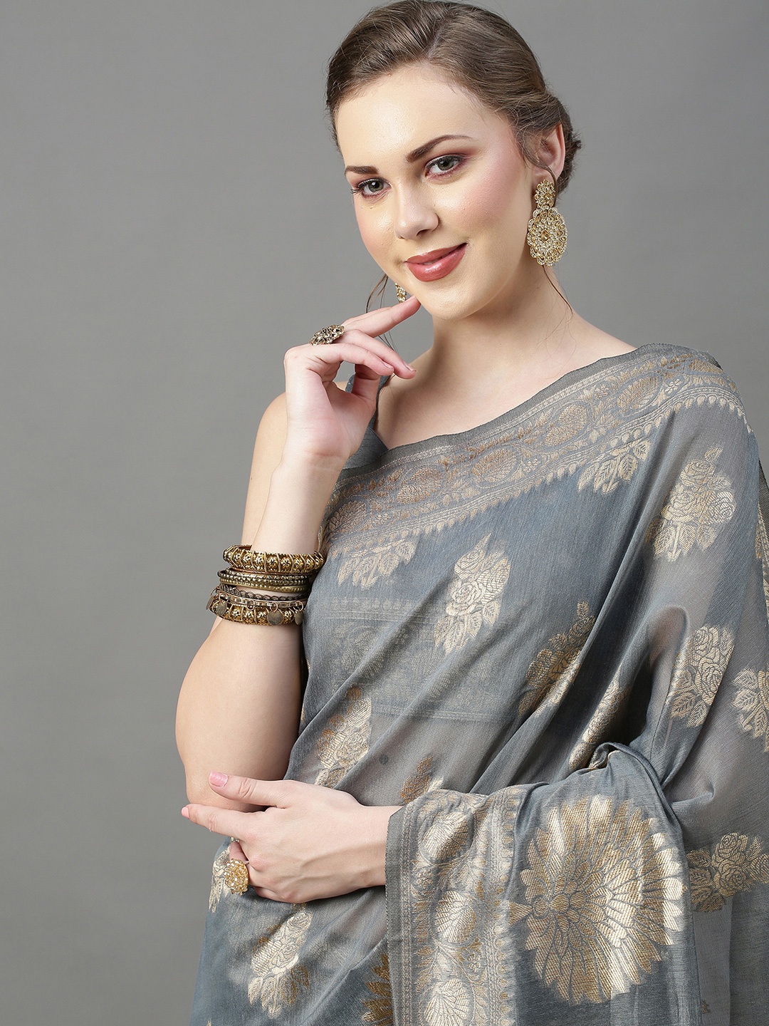 

Mitera Grey & Gold-Toned Ethnic Motifs Zari Silk Cotton Banarasi Saree