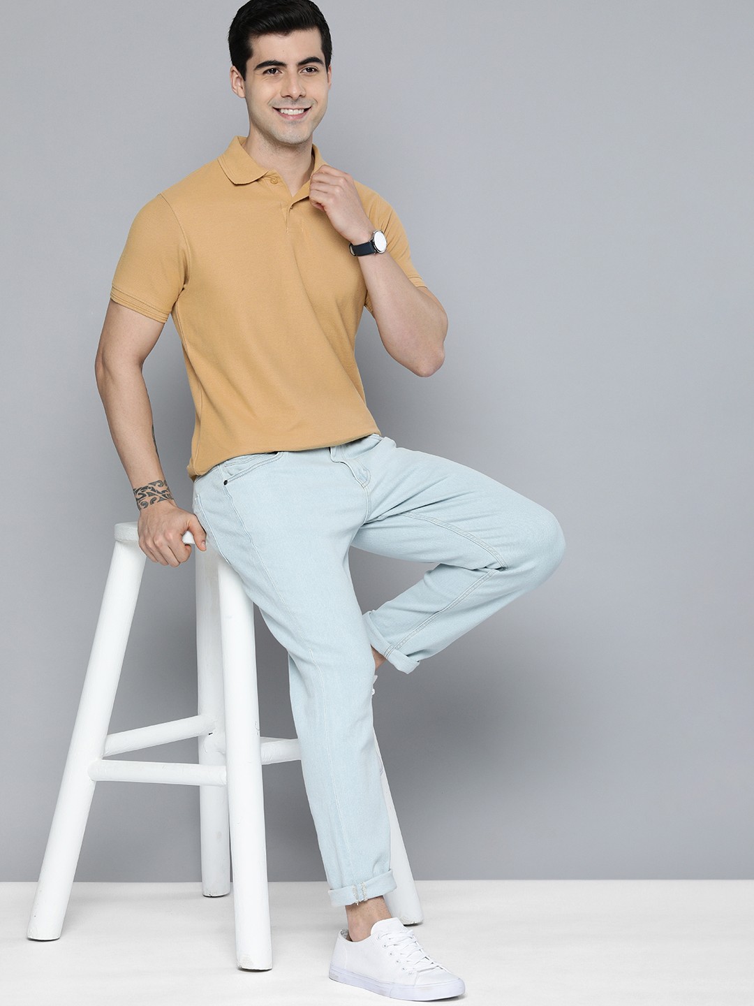 

Mast & Harbour Men Beige Solid Polo Collar Casual T-shirt
