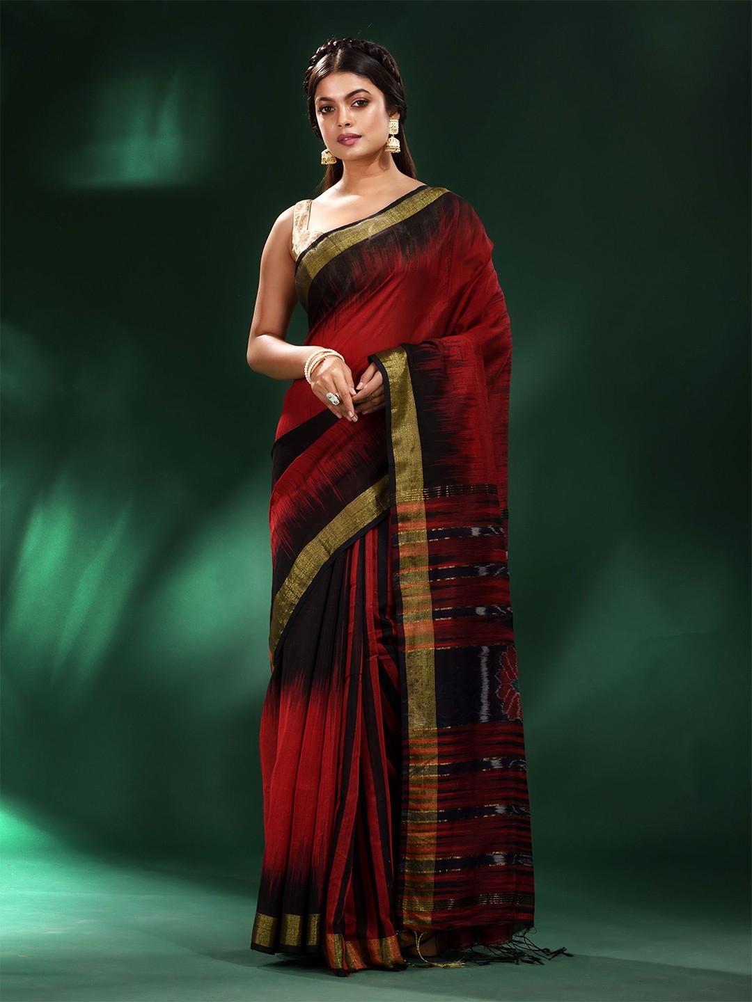 

Charukriti Red & Gold-Toned Woven Design Zari Ikat Blended Cotton Saree