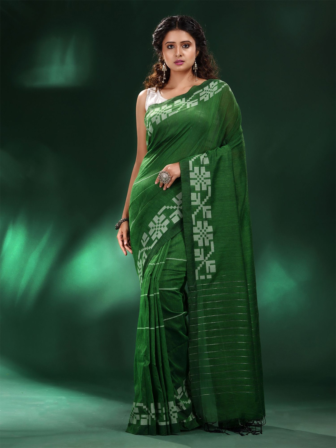 

Charukriti Green & Silver-Toned Woven Design Zari Pure Cotton Saree