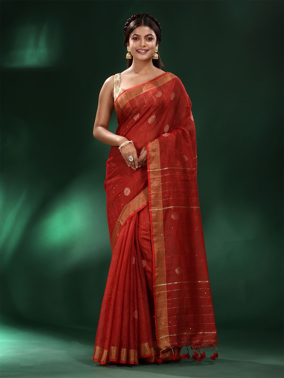 

Charukriti Red & Gold-Toned Embellished Sequinned Saree
