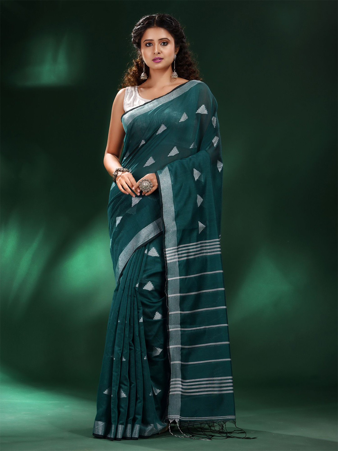 

Charukriti Green & Silver Woven Design Zari Saree