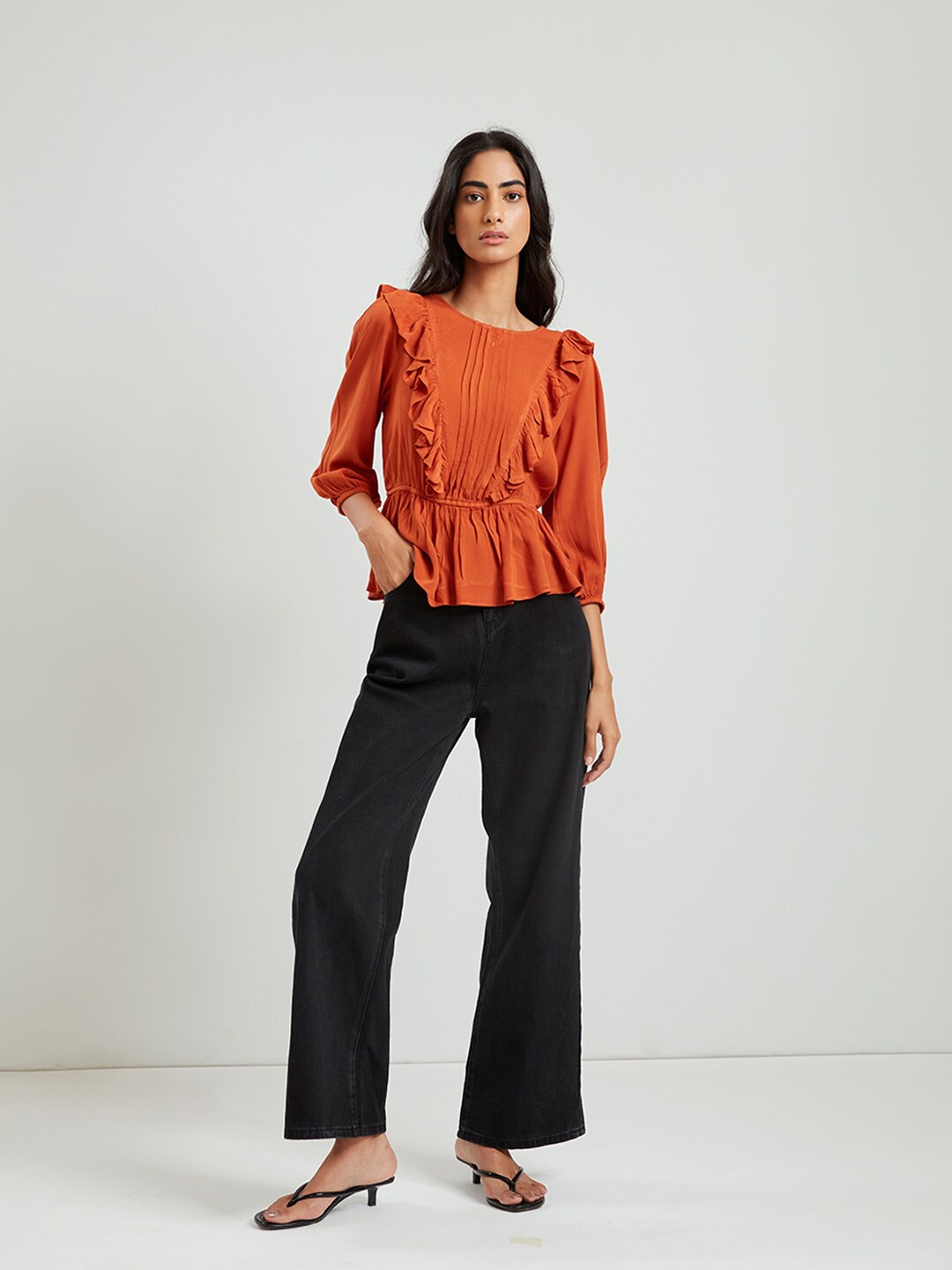 

COVER STORY Women Rust Orange Ruffles Peplum Top