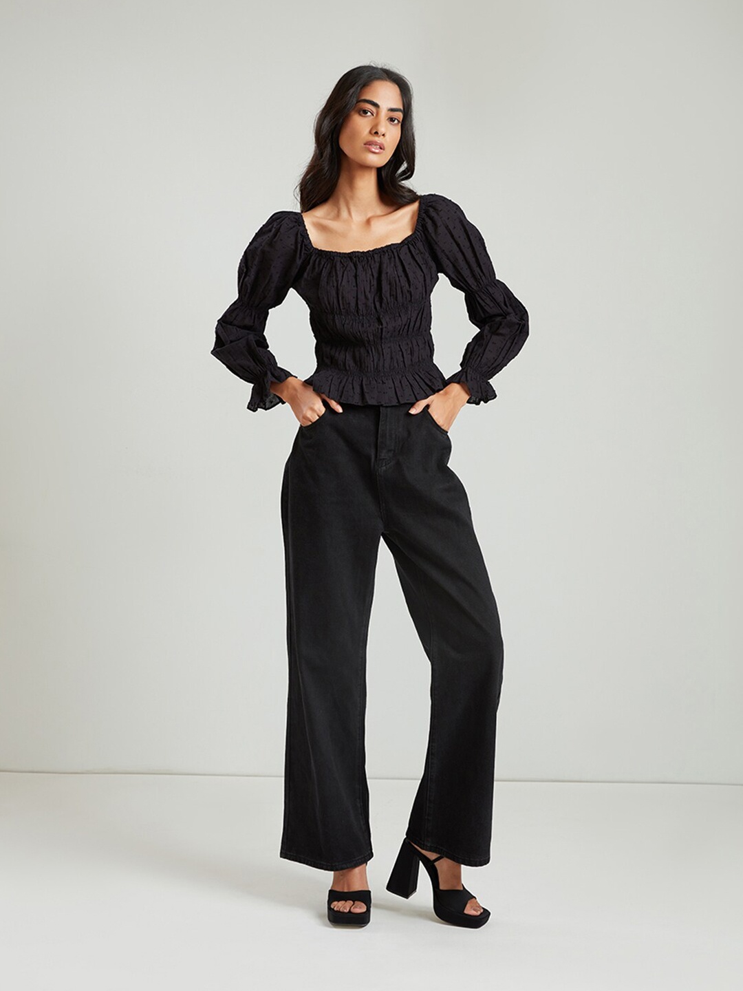 

COVER STORY Women Black Solid Top