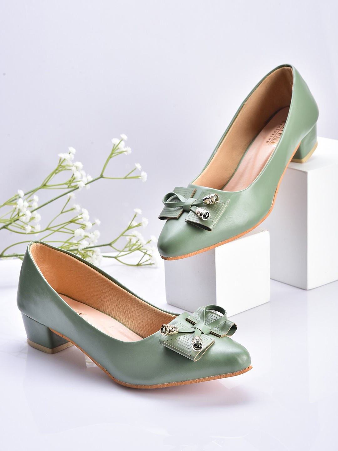 

Moonwalk Green Embellished Block Pumps with Bows