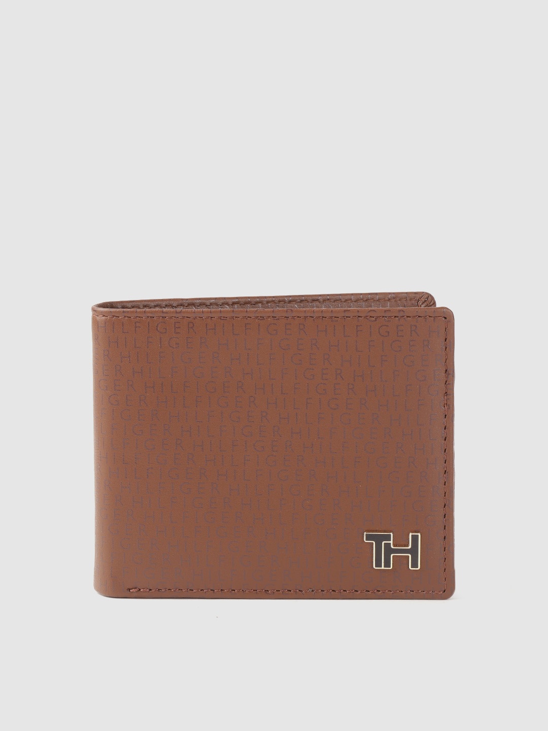 

Tommy Hilfiger Men Tan Typography Printed Leather Two Fold Wallet