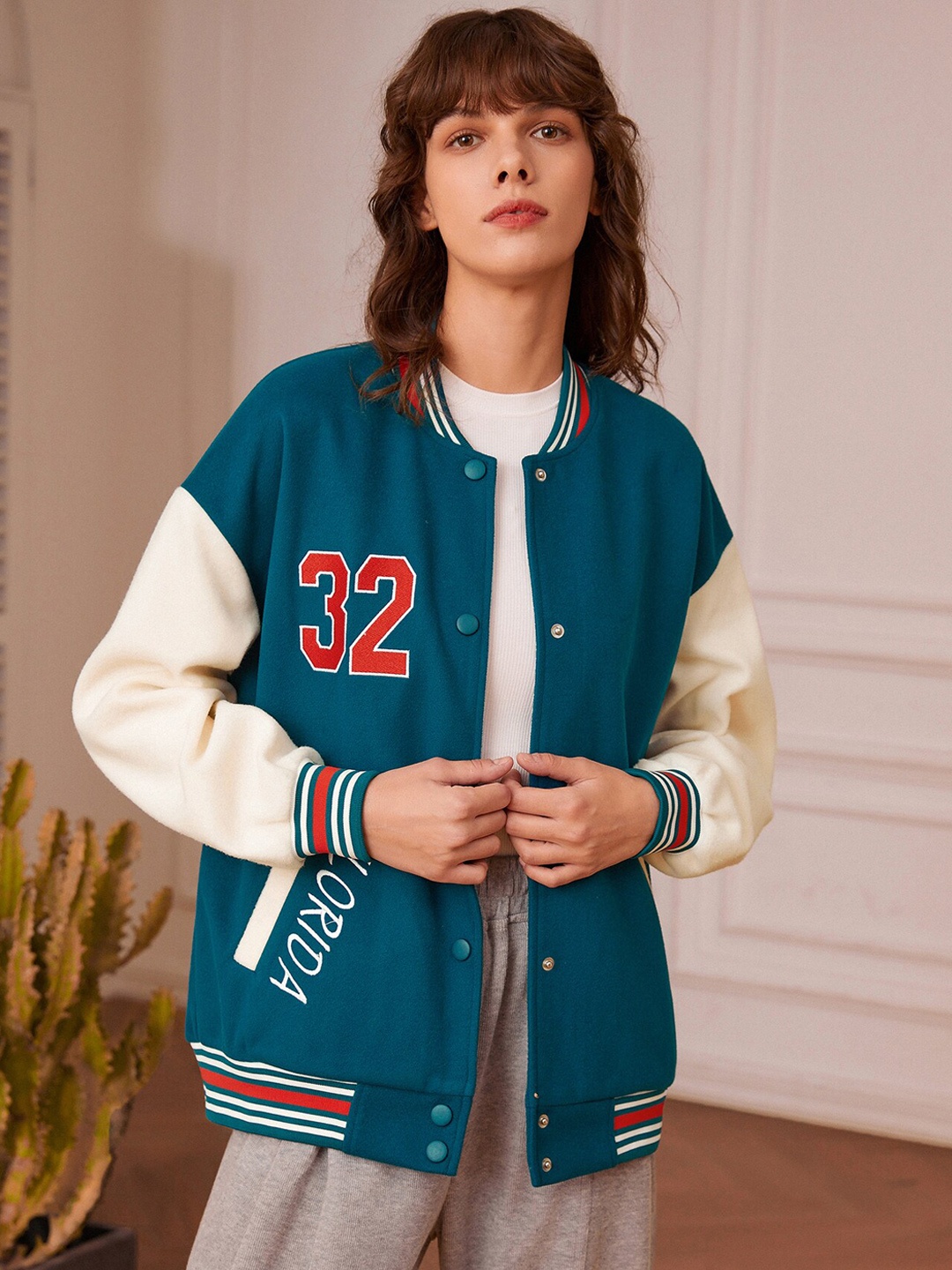 

URBANIC Women Blue Typography Varsity Jacket