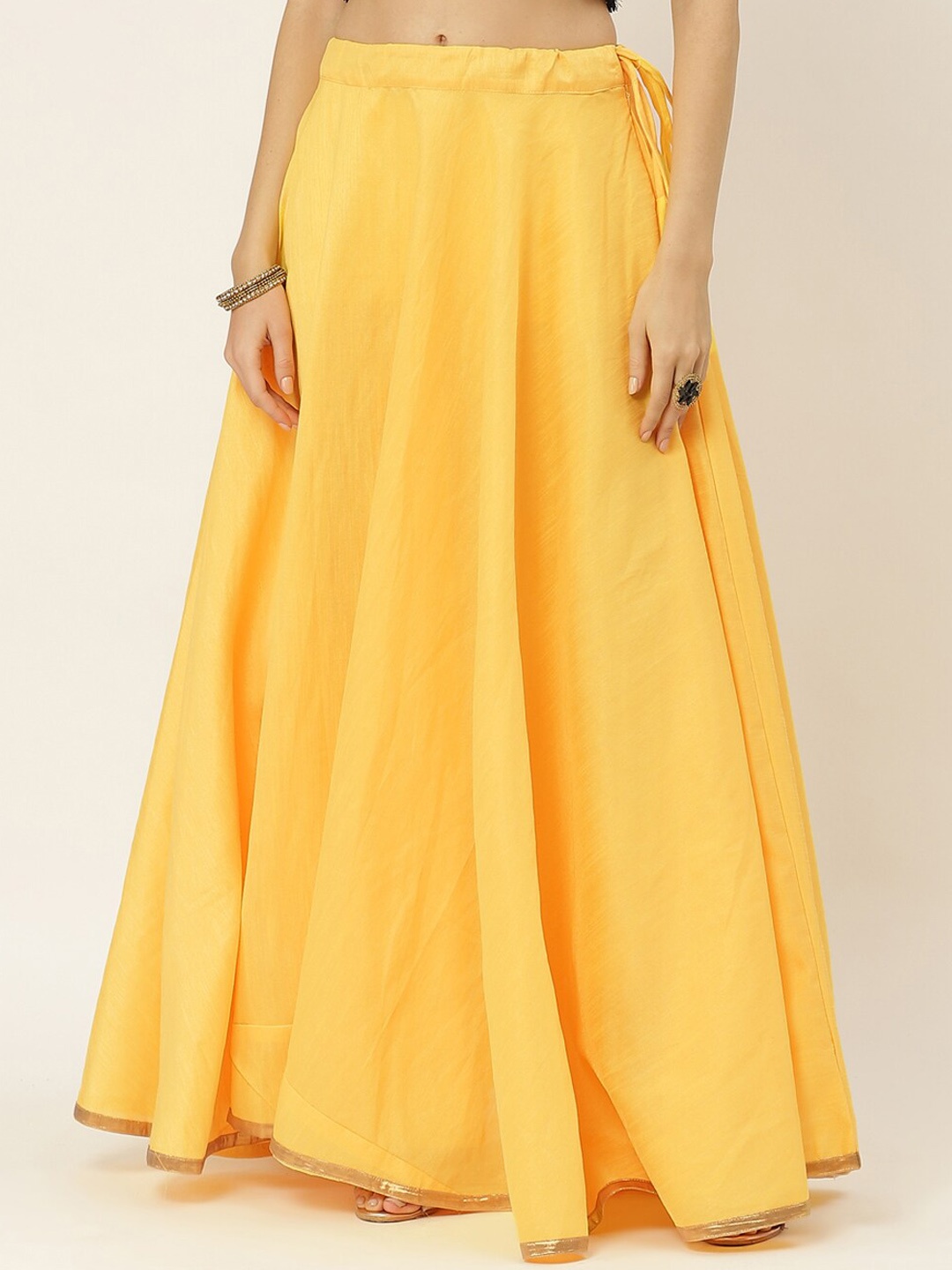 

Studio Shringaar Women Yellow Solid Flared Maxi Skirt