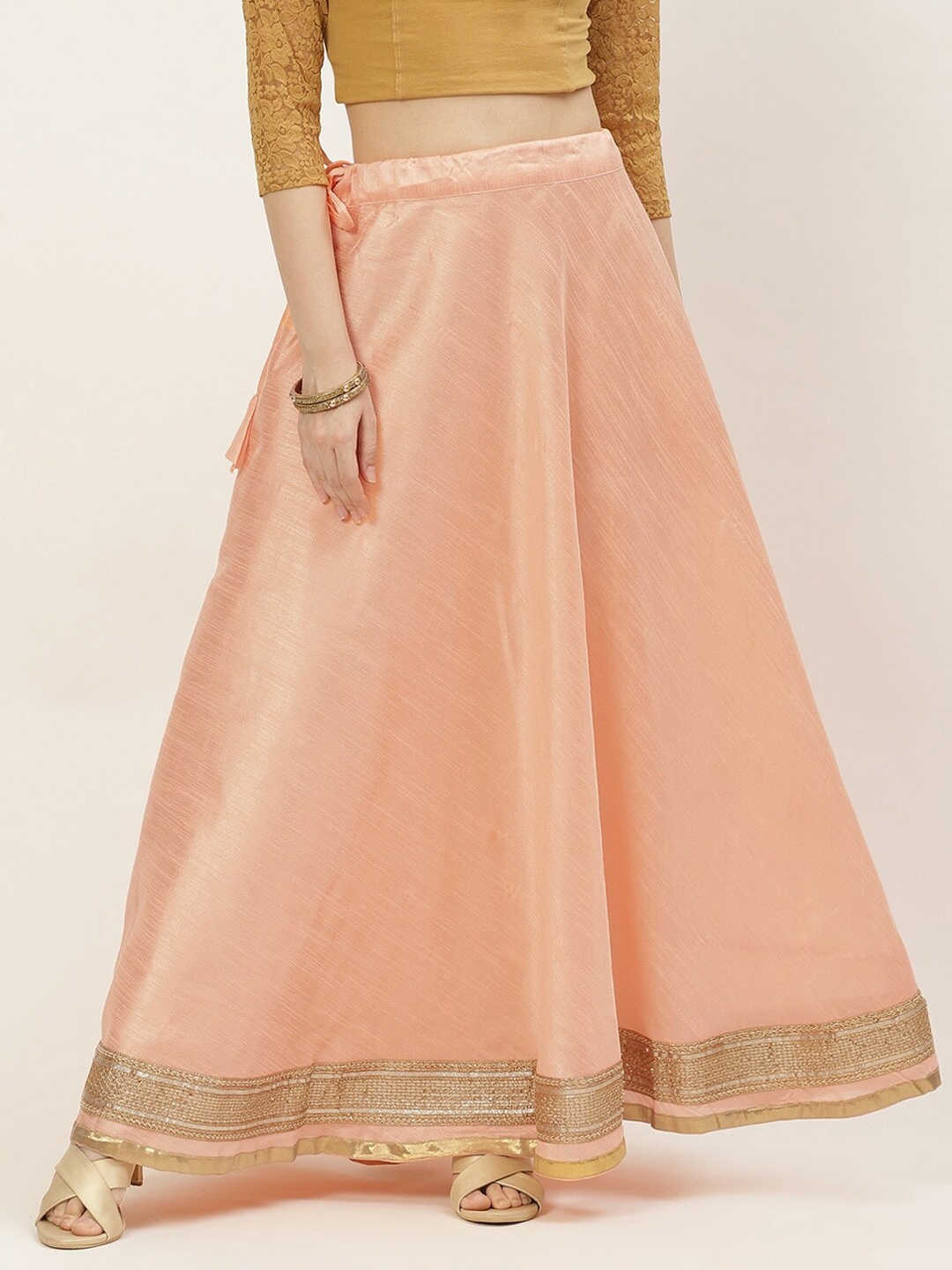 

Studio Shringaar Women Peach-Coloured Solid Flared Maxi Skirts