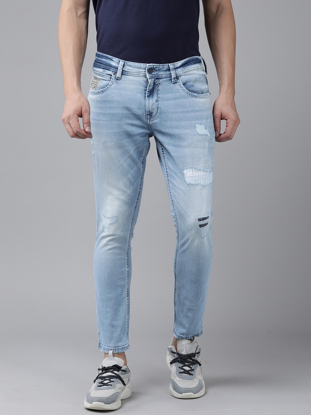 

SPYKAR Men Kano Slim Fit Mildly Distressed Light Fade Stretchable Mid-Rise Jeans, Blue