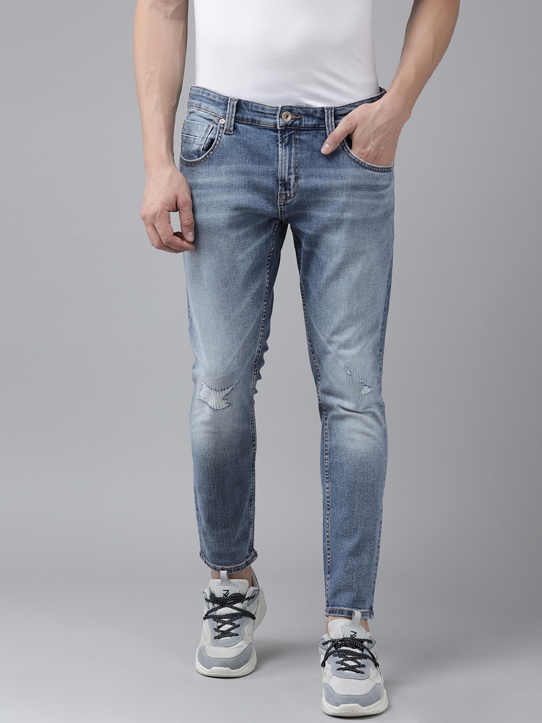 

SPYKAR Men Skinny Fit Mildly Distressed Heavy Fade Stretchable Jeans, Blue
