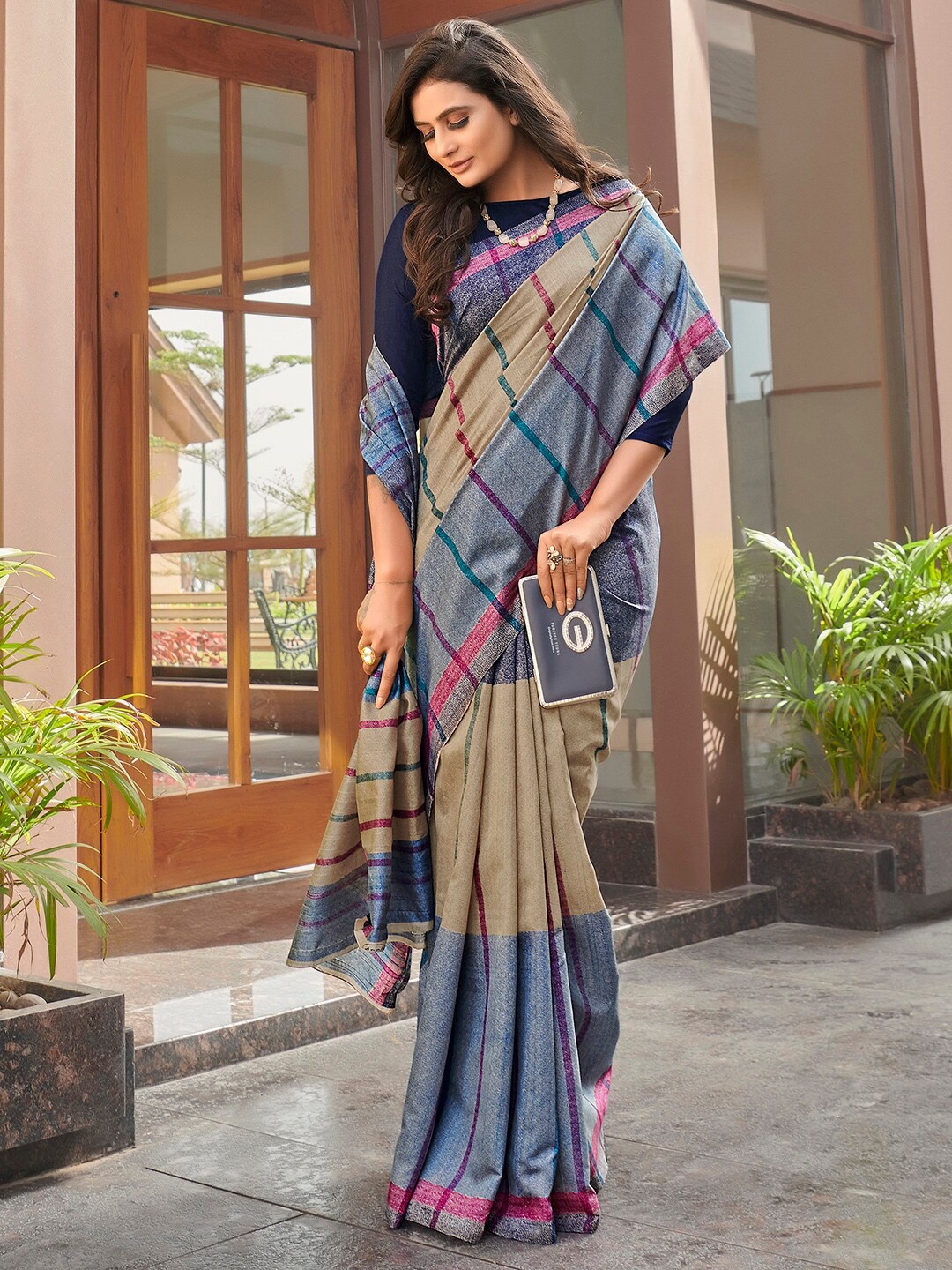 

Mitera Blue & Beige Striped Art Silk Taant Saree