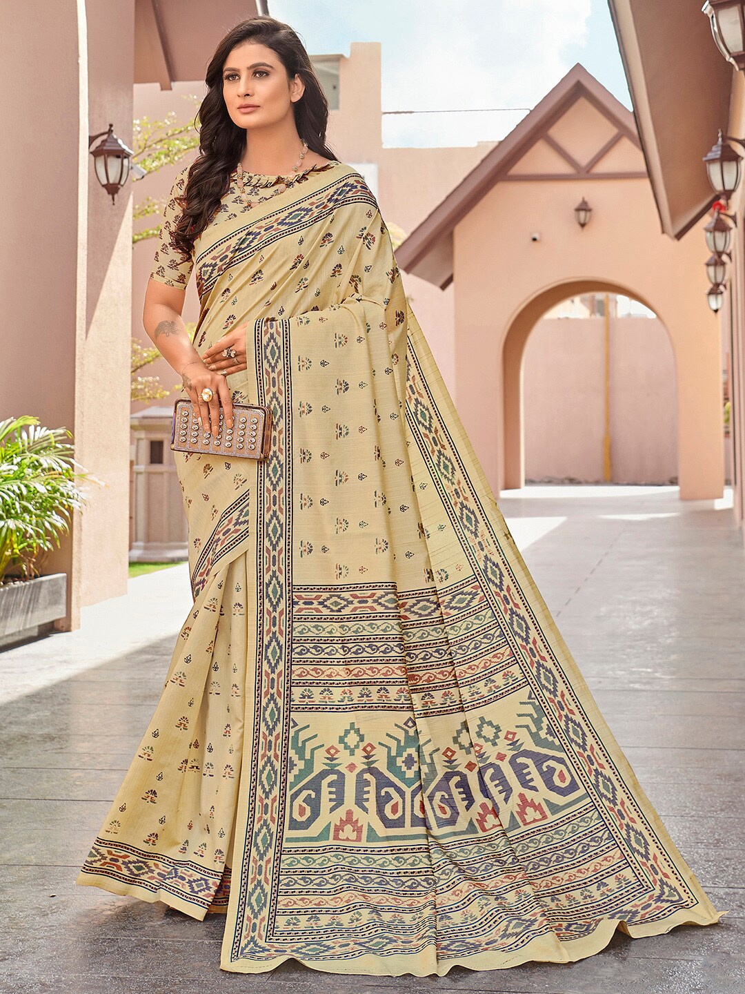 

Mitera Beige & Green Ethnic Motifs Art Silk Ikat Saree