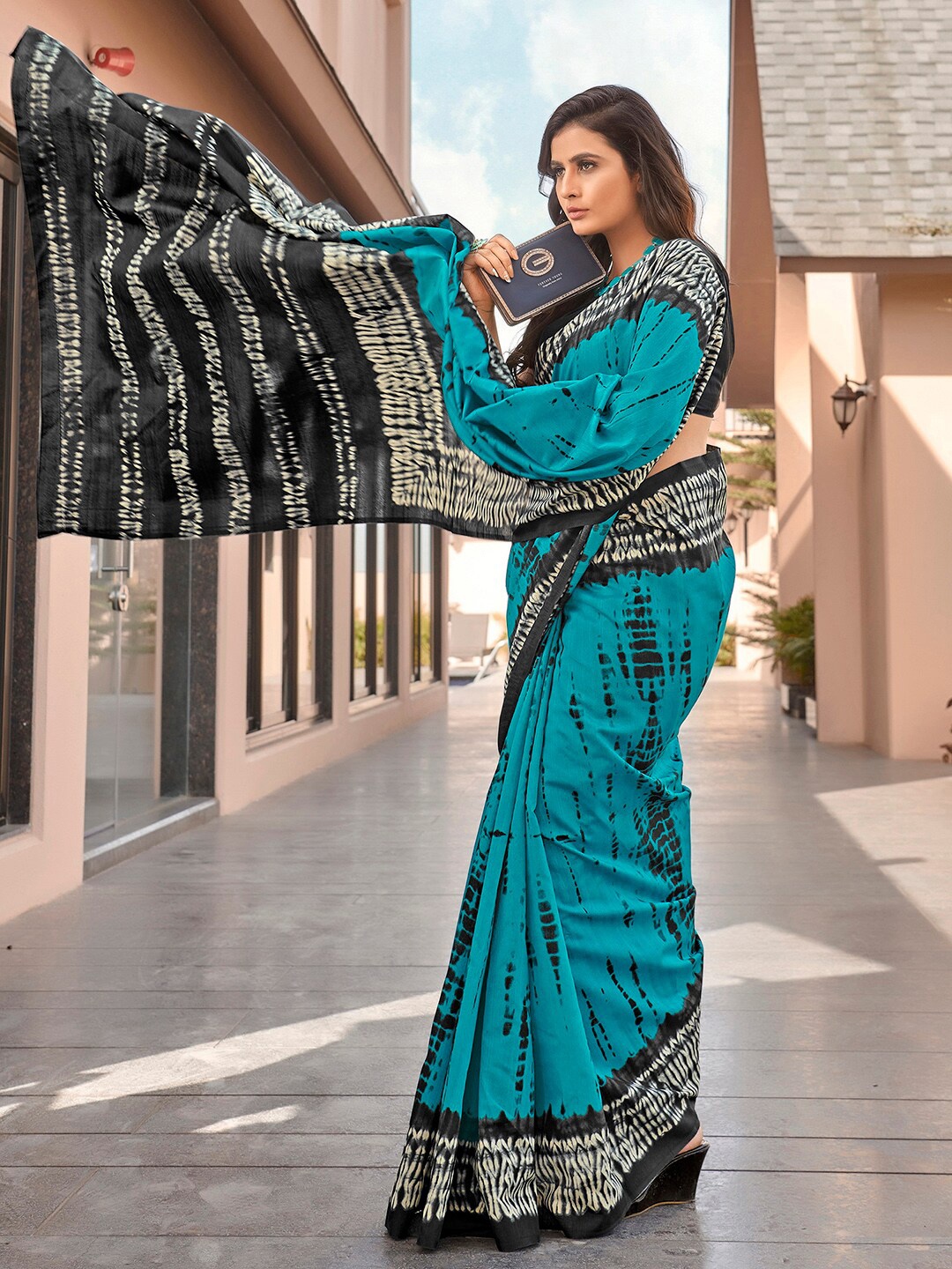 

Mitera Blue & Black Tie and Dye Art Silk Block Print Saree