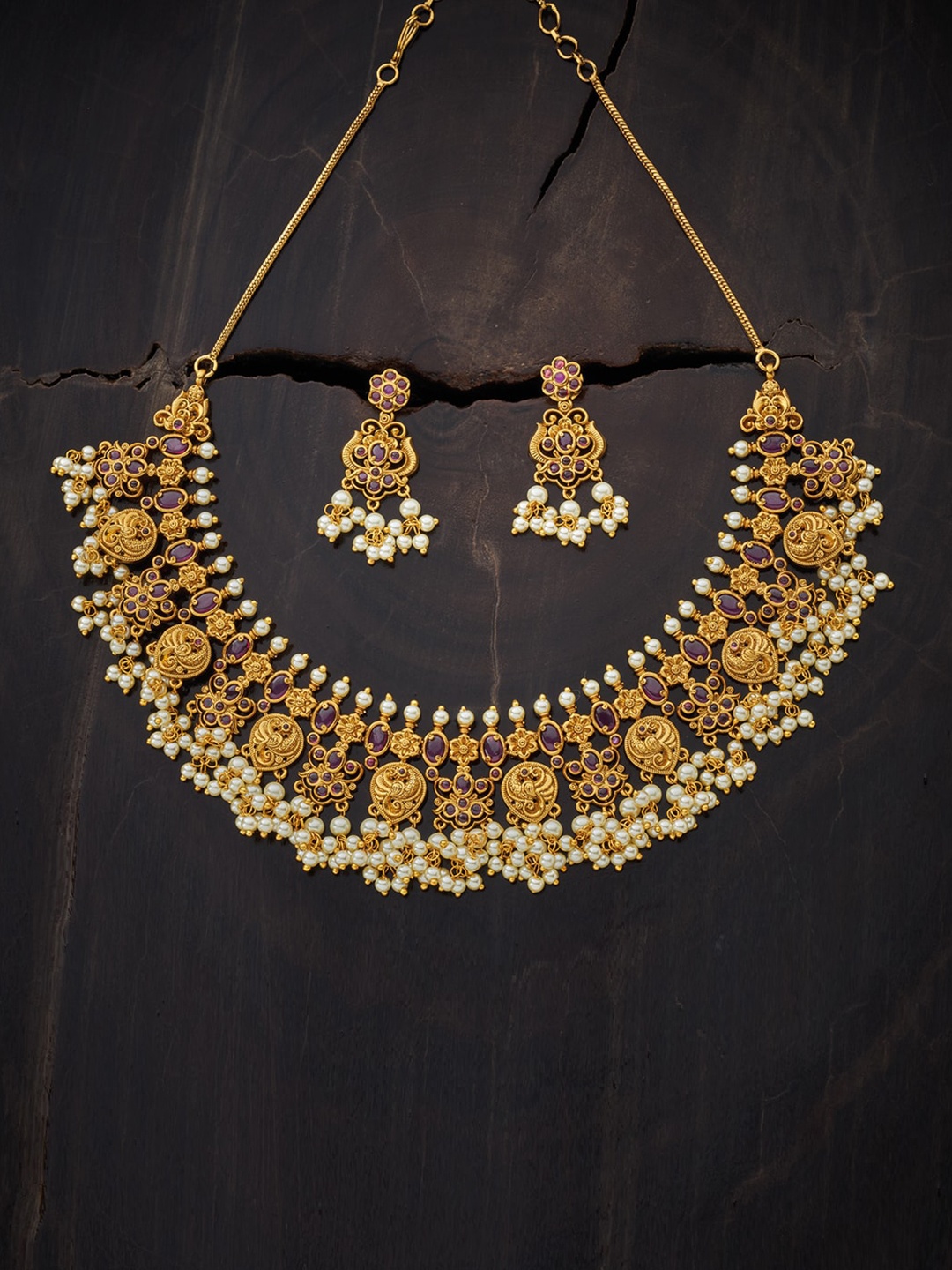 

Kushal's Fashion Jewellery Gold-Toned White & Red Stone-Studded & Pearl Beaded Jewellery Set