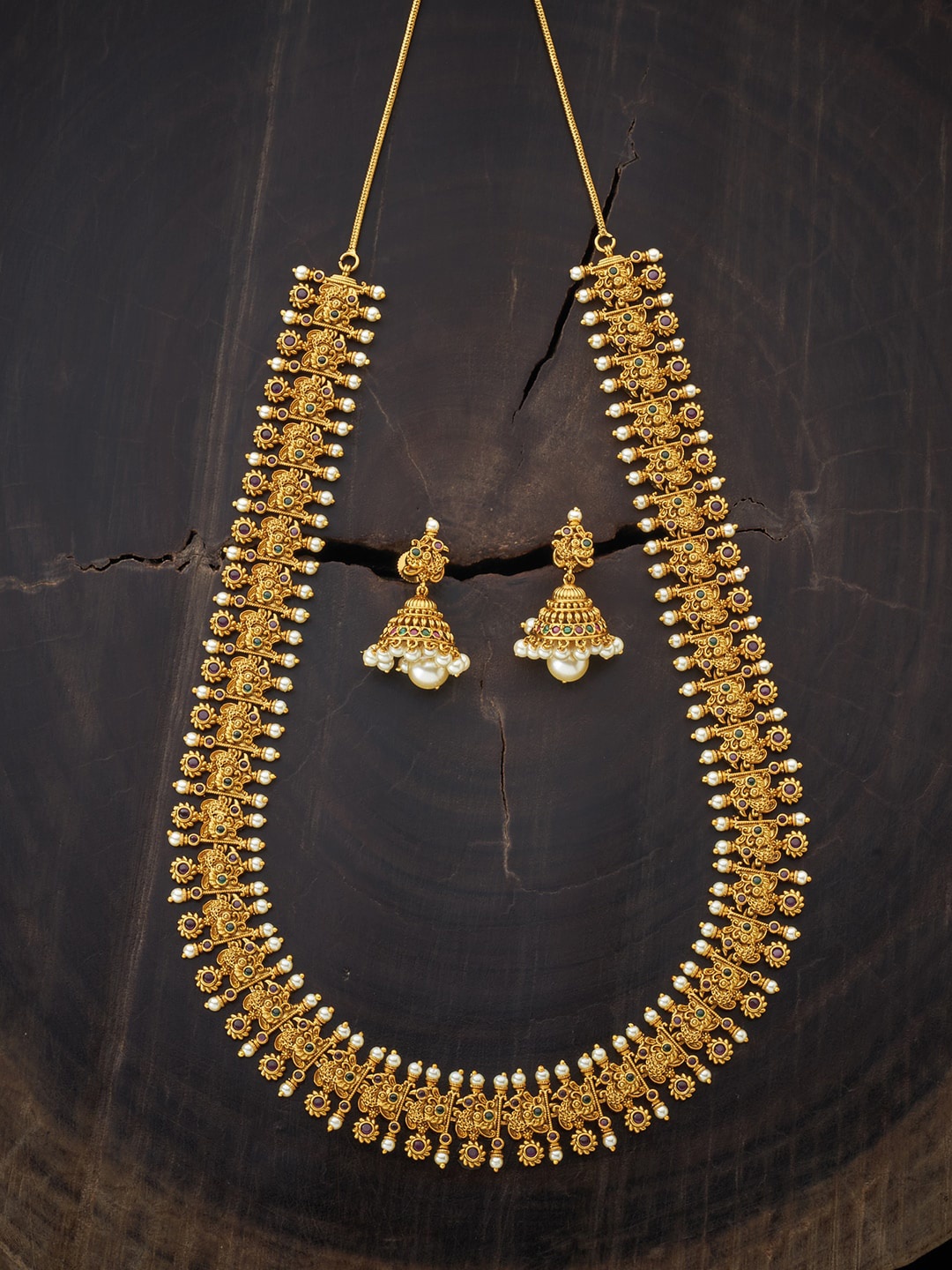 

Kushal's Fashion Jewellery Gold-Toned & Red Stone Studded & Beaded Jewellery Set